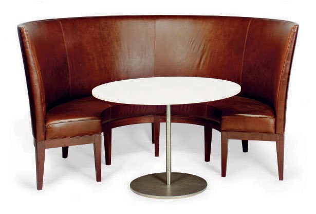 A CONTEMPORARY BROWN LEATHER-UPHOLSTERED MAHOGANY BOOTH AND A BRUSHED-METAL AND STONE-TOP CIRCULAR TABLE,