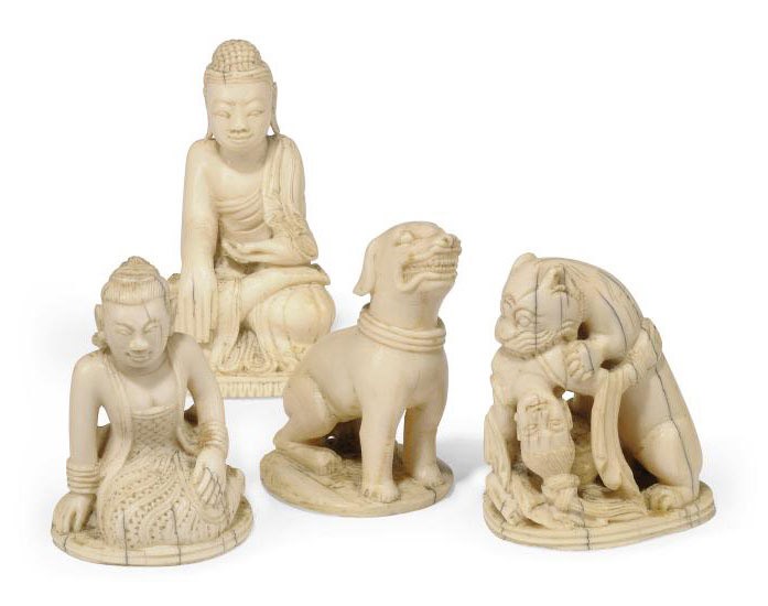 FOUR CHINESE IVORY CHESS PIECES