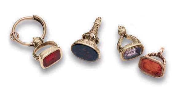 A GROUP OF FOUR FOB SEALS