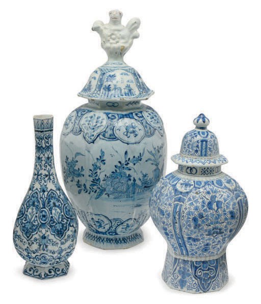 TWO DUTCH DELFT BLUE AND WHITE RIBBED BALUSTER VASES AND TWO COVERS, AND A RIBBED PEAR-FORM VASE,