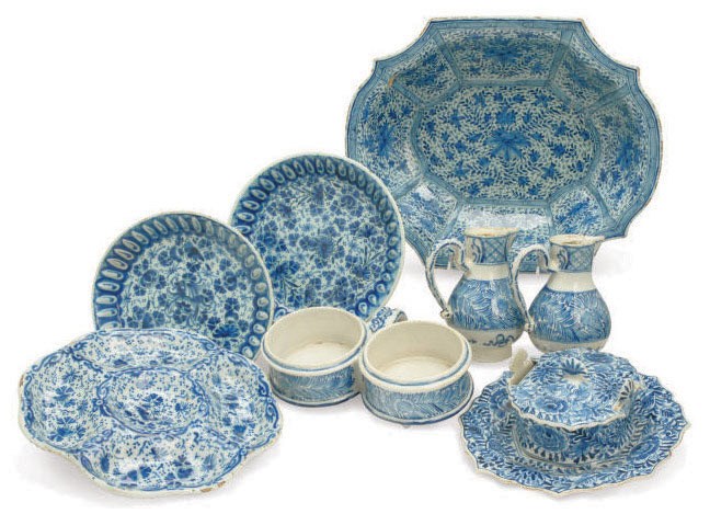 A GROUP OF DUTCH DELFT BLUE AND WHITE FLOWER-PAINTED TABLE WARES,