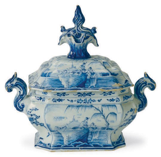 A DUTCH DELFT BLUE AND WHITE LANDSCAPE-DECORATED BOMBE OBLONG OCTAGONAL TUREEN AND COVER,
