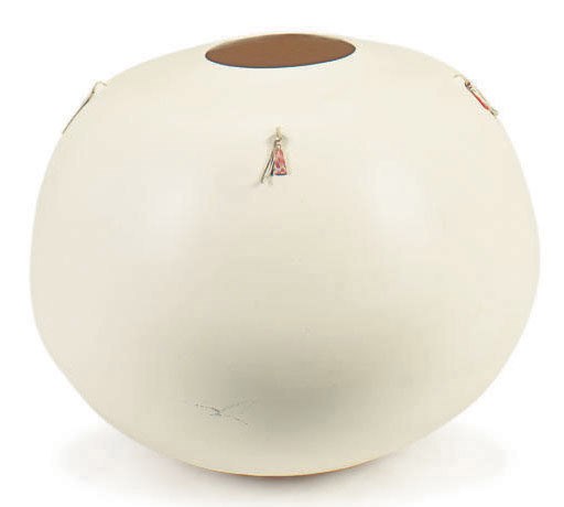 A LARGE SOUTHWEST-STYLE BISCUIT POTTERY JAR WITH LEATHER AND HARDSTONE TASSELS,