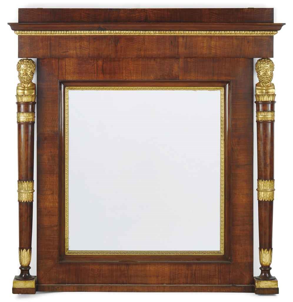 A NORTH EUROPEAN MAHOGANY AND GILTWOOD OVERMANTEL