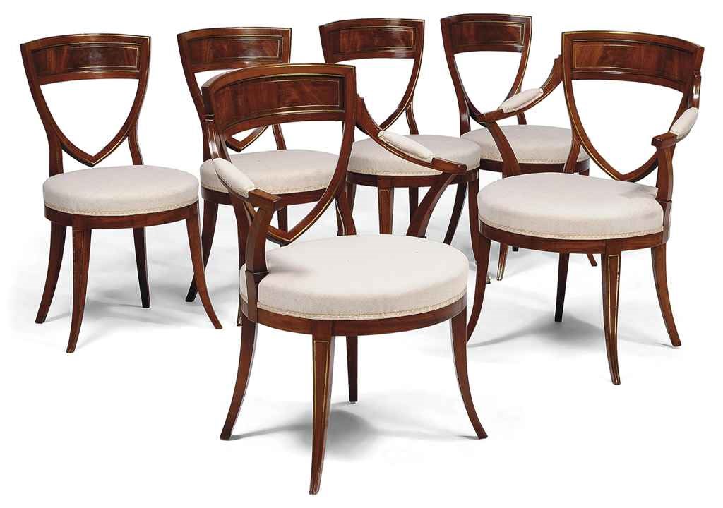 A SET OF SIX NORTH EUROPEAN BRASS INLAID WALNUT DINING CHAIRS