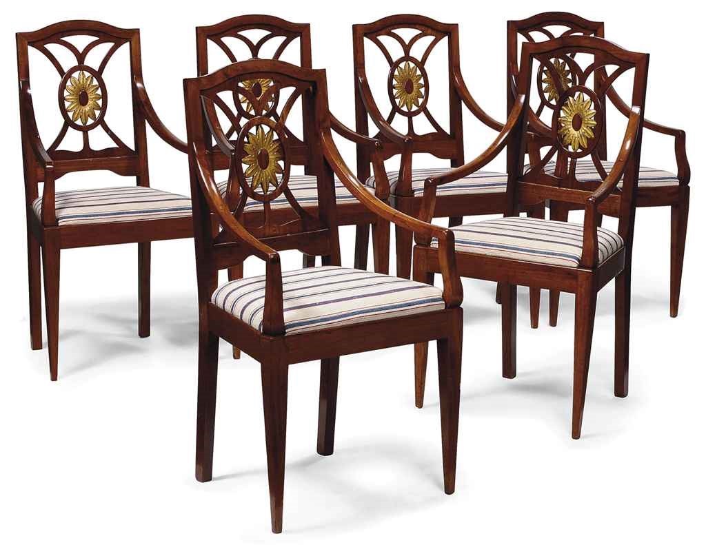 A SET OF SIX EUROPEAN MAHOGANY OPEN-ARM CHAIRS