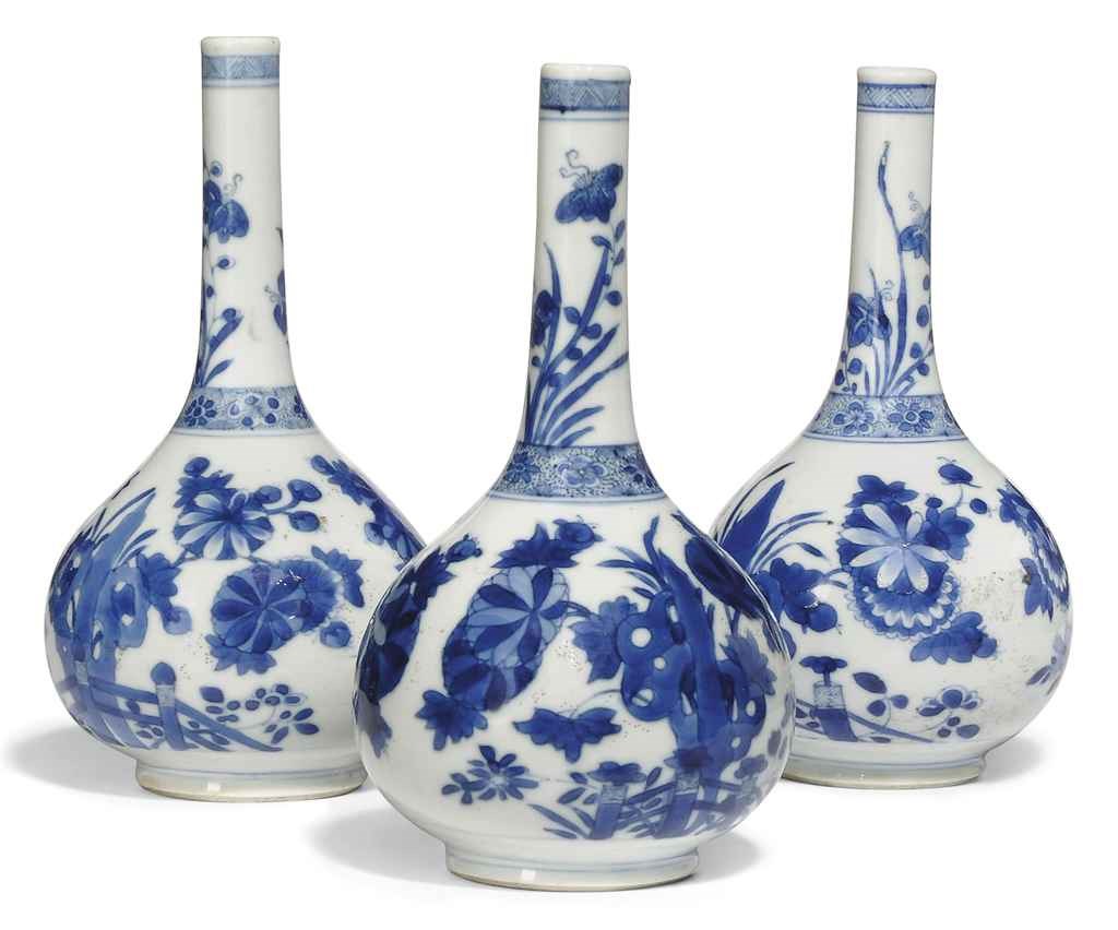 THREE CHINESE BLUE AND WHITE BOTTLE VASES