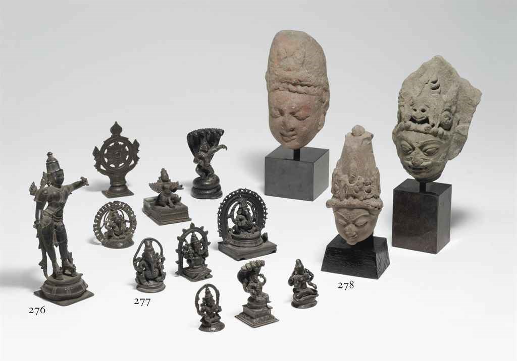 A group of ten small bronzes