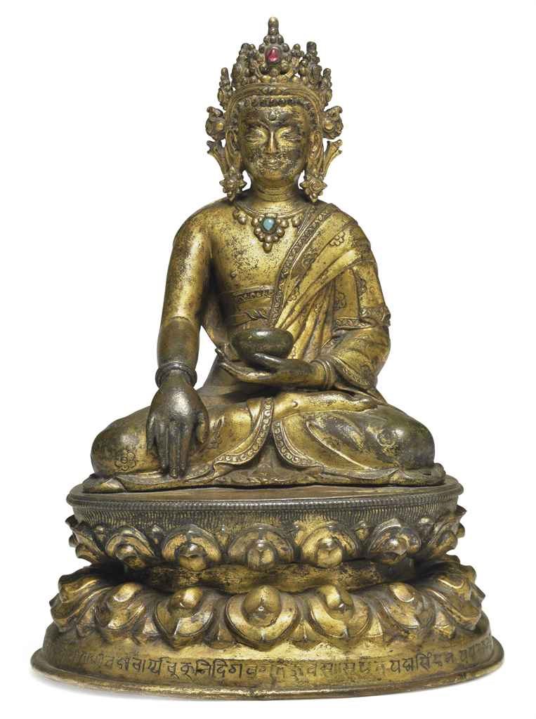 A gilt bronze figure of Buddha