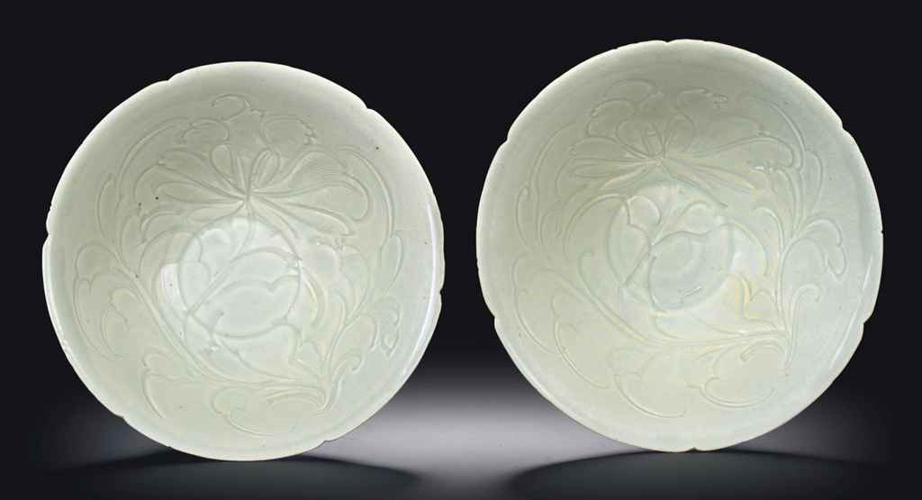 A PAIR OF QINGBAI CARVED BOWLS