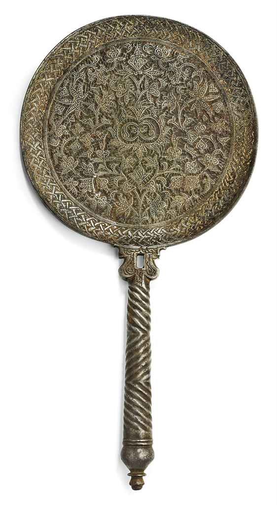 A TIMURID ENGRAVED STEEL MIRROR