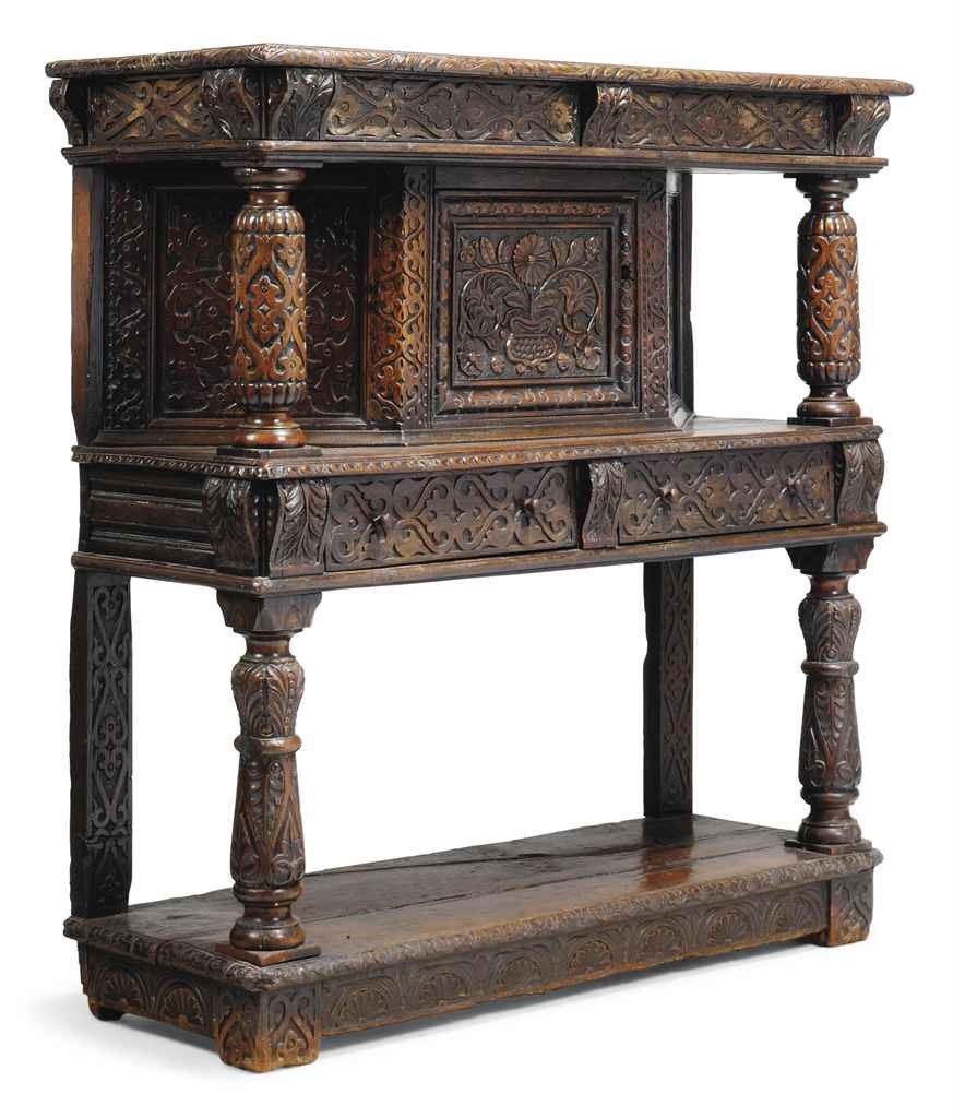 AN OAK LIVERY CUPBOARD