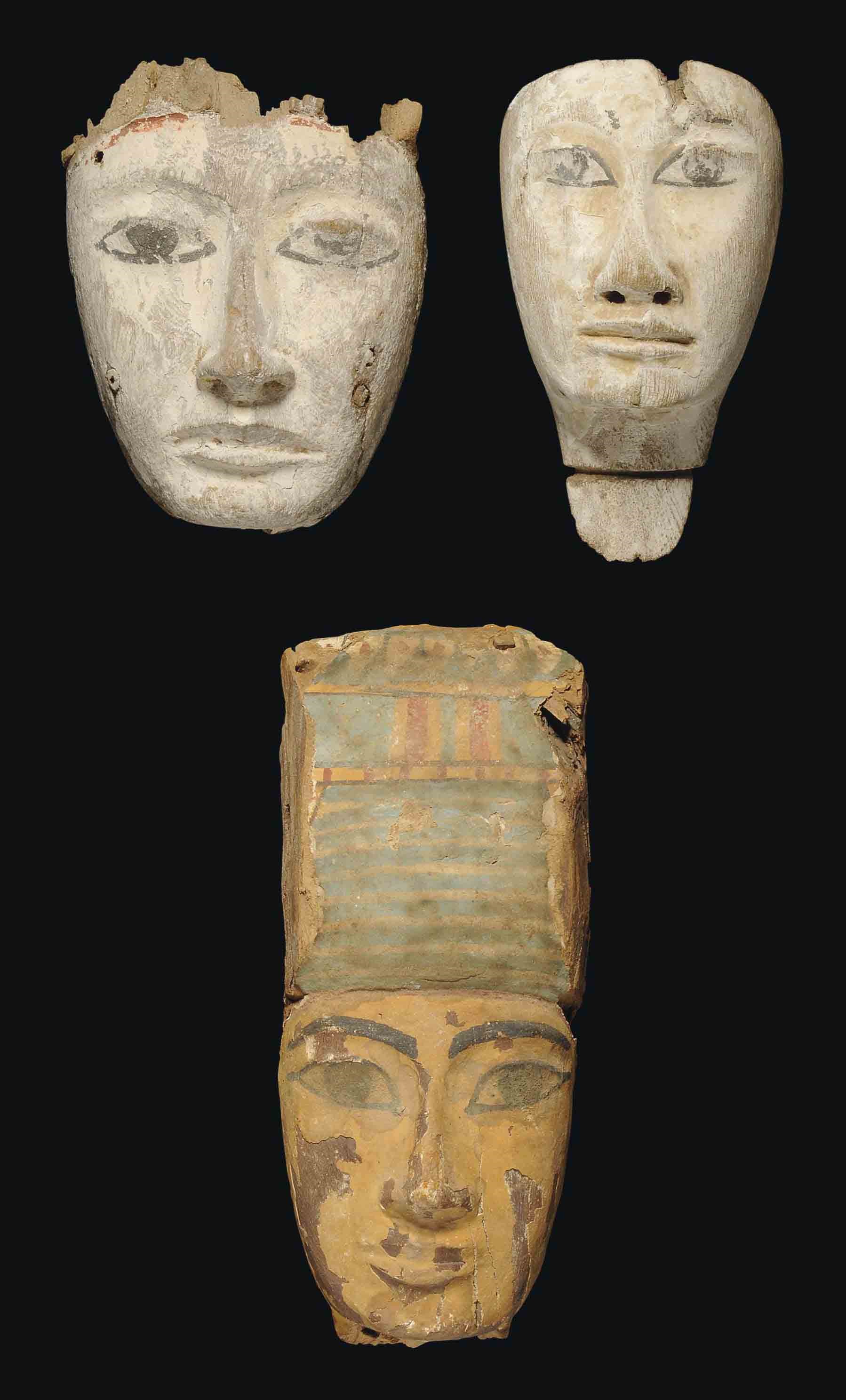 AN EGYPTIAN GESSO-PAINTED WOOD SARCOPHAGUS MASK