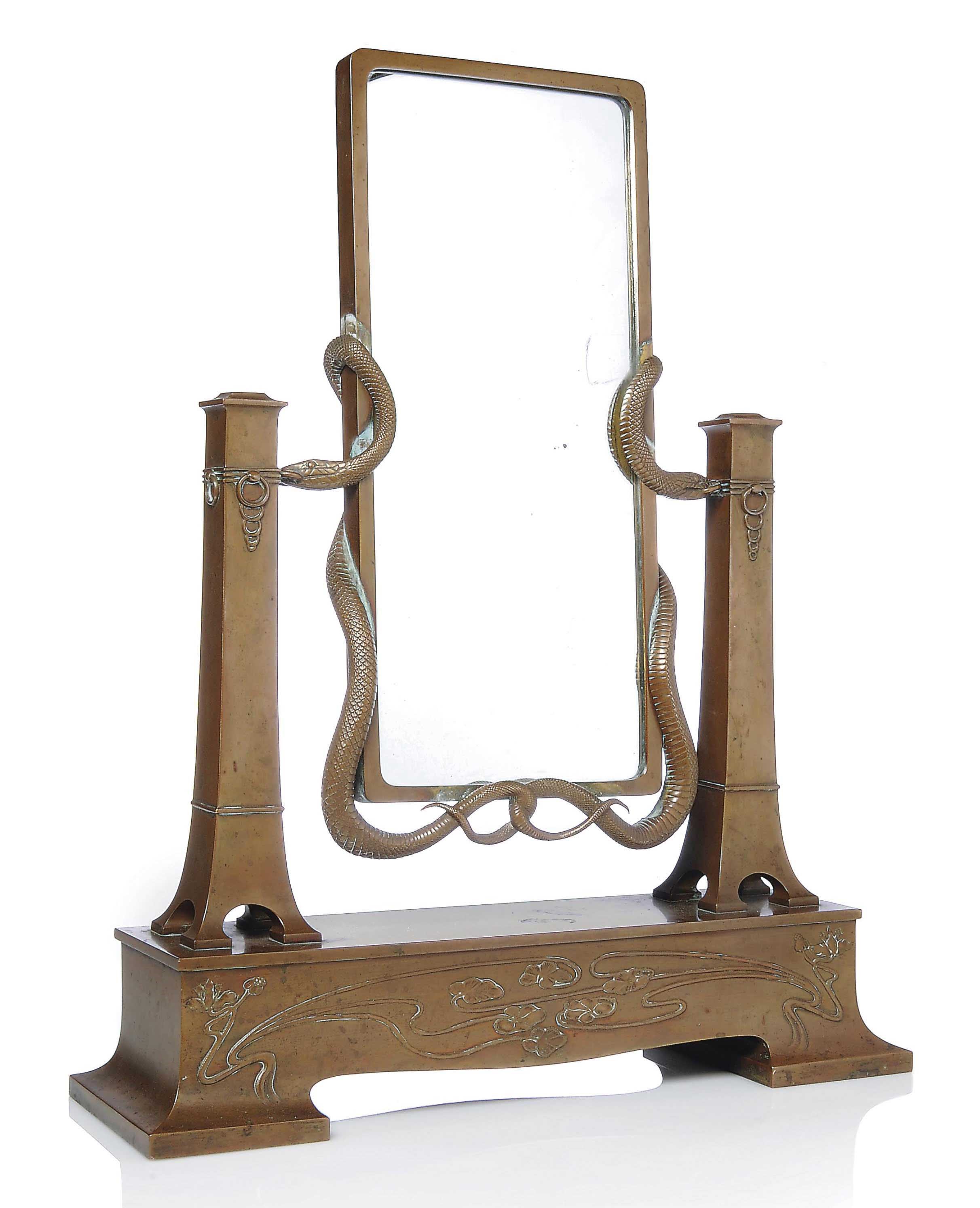 A K & K KUNST-ERZGIESSEREI PATINATED 'SERPENT' DRESSING TABLE MIRROR