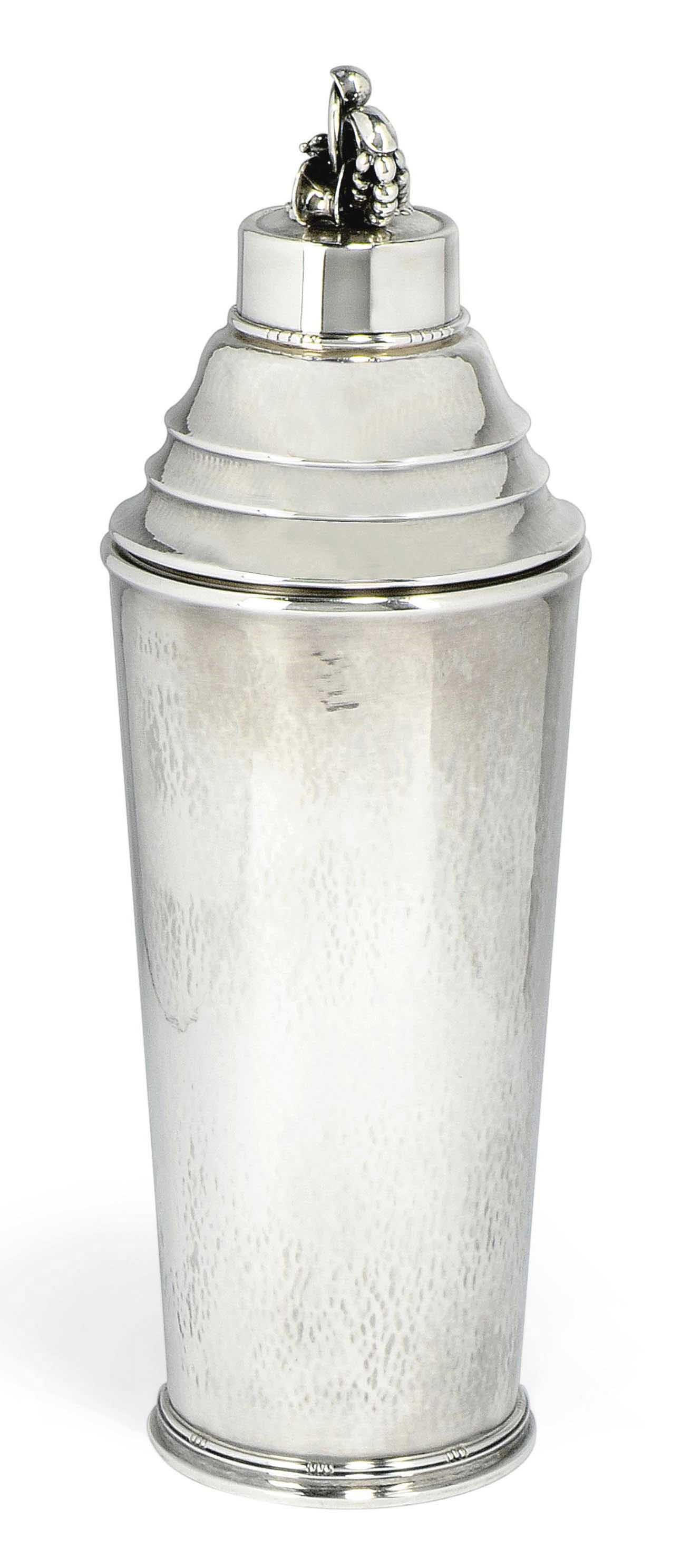 A GEORG JENSEN SILVER COCKTAIL SHAKER DESIGNED BY HARALD NIELSEN