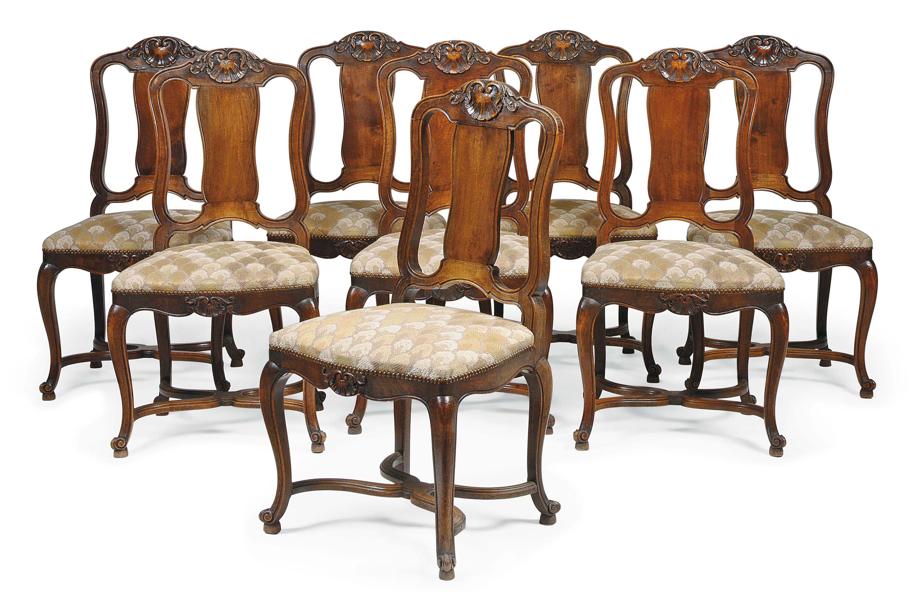 A SET OF EIGHT WALNUT DINING CHAIRS