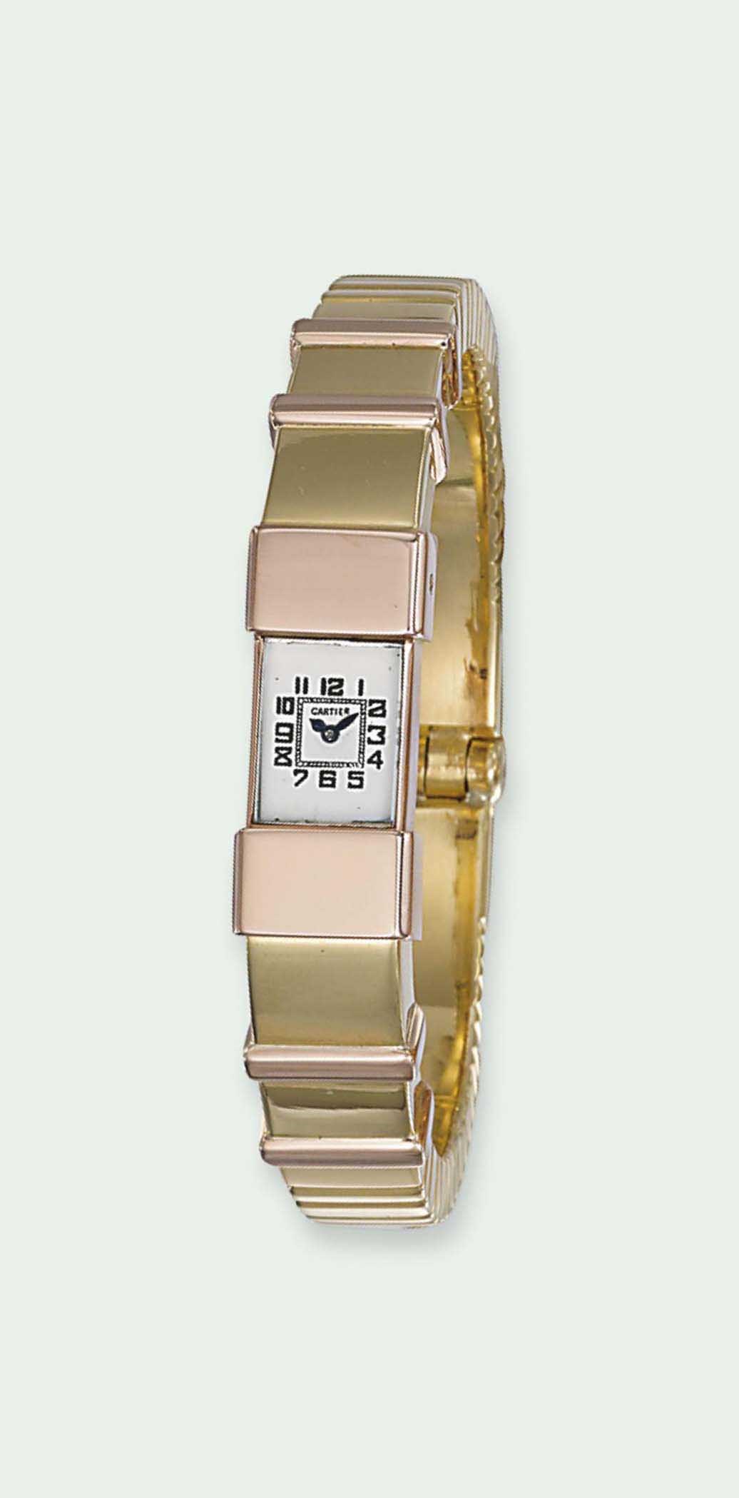 A LADY'S BANGLE WRISTWATCH, BY CARTIER