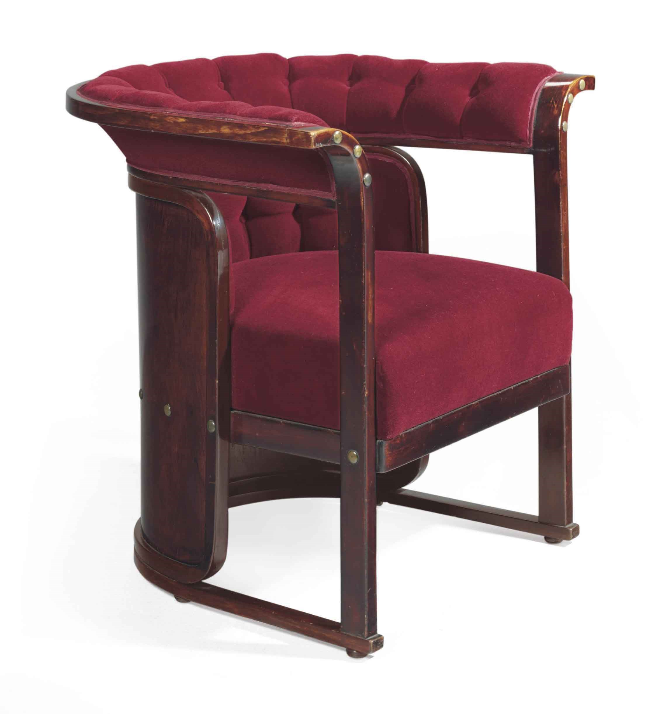 AN AUSTRIAN BEECH AND BRASS 'BUENOS AIRES' ARMCHAIR,