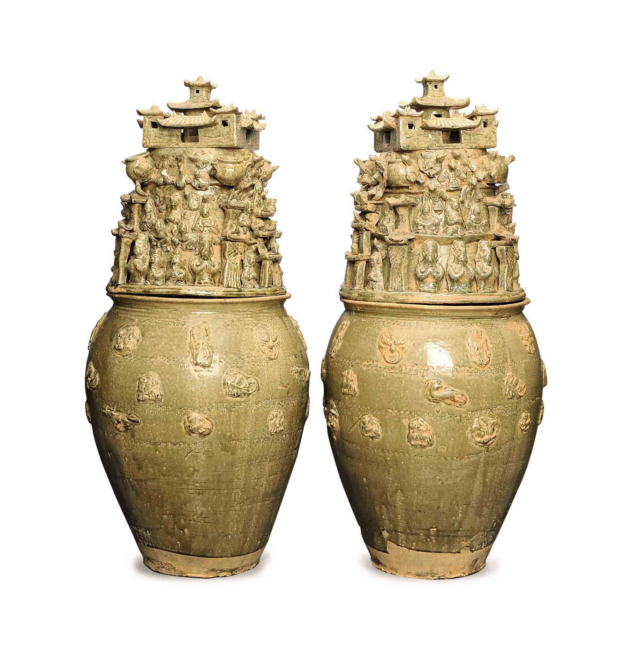 A PAIR OF CHINESE YUEYAO-STYLE GLAZED POTTERY FUNERARY JARS AND COVERS,