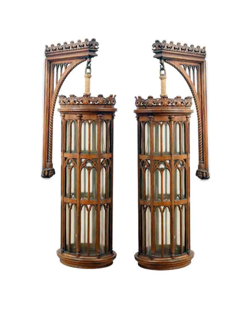 A SET OF SIX OAK GOTHIC REVIVAL HANGING LANTERNS