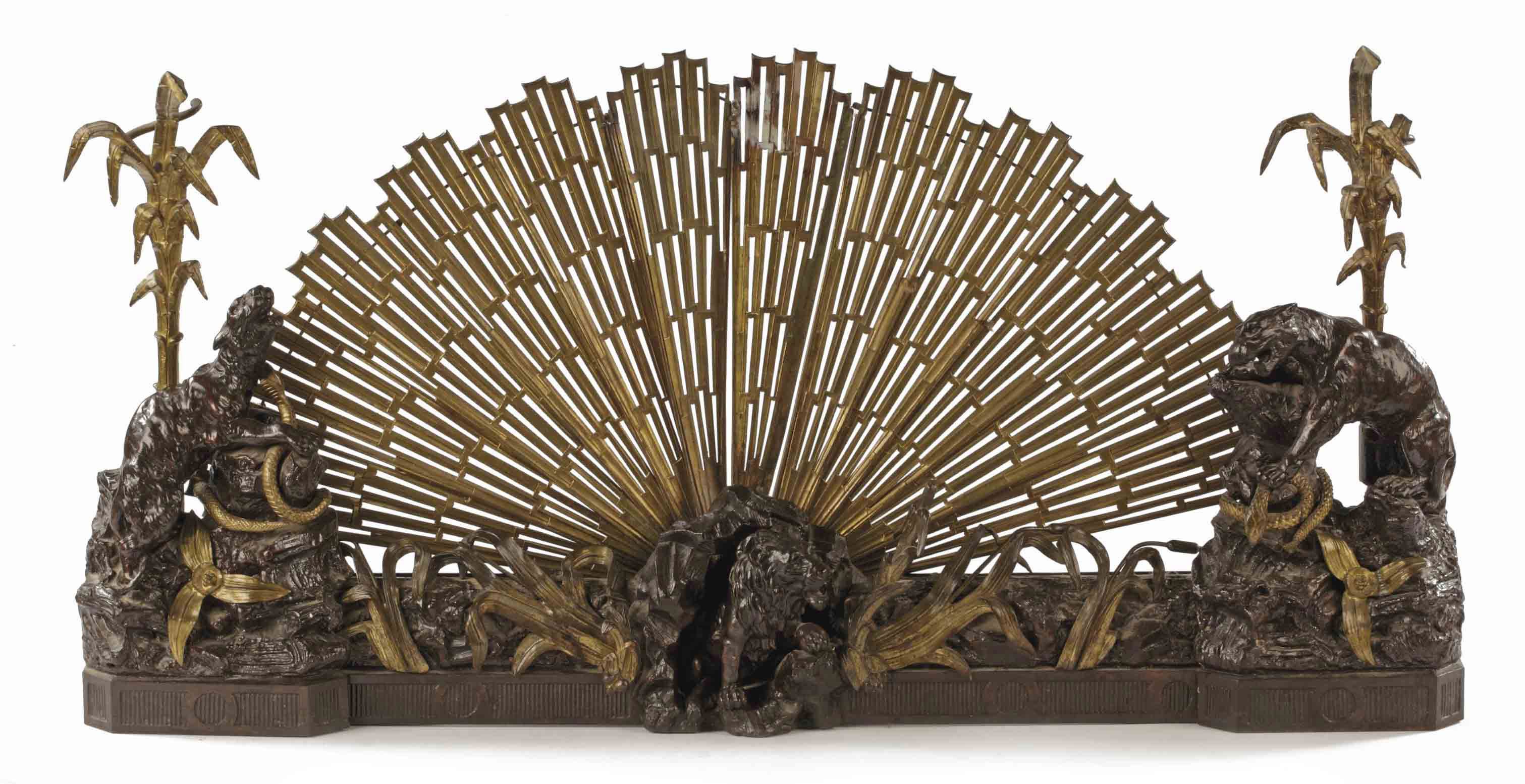 A FRENCH ORMOLU AND PATINATED BRONZE FENDER