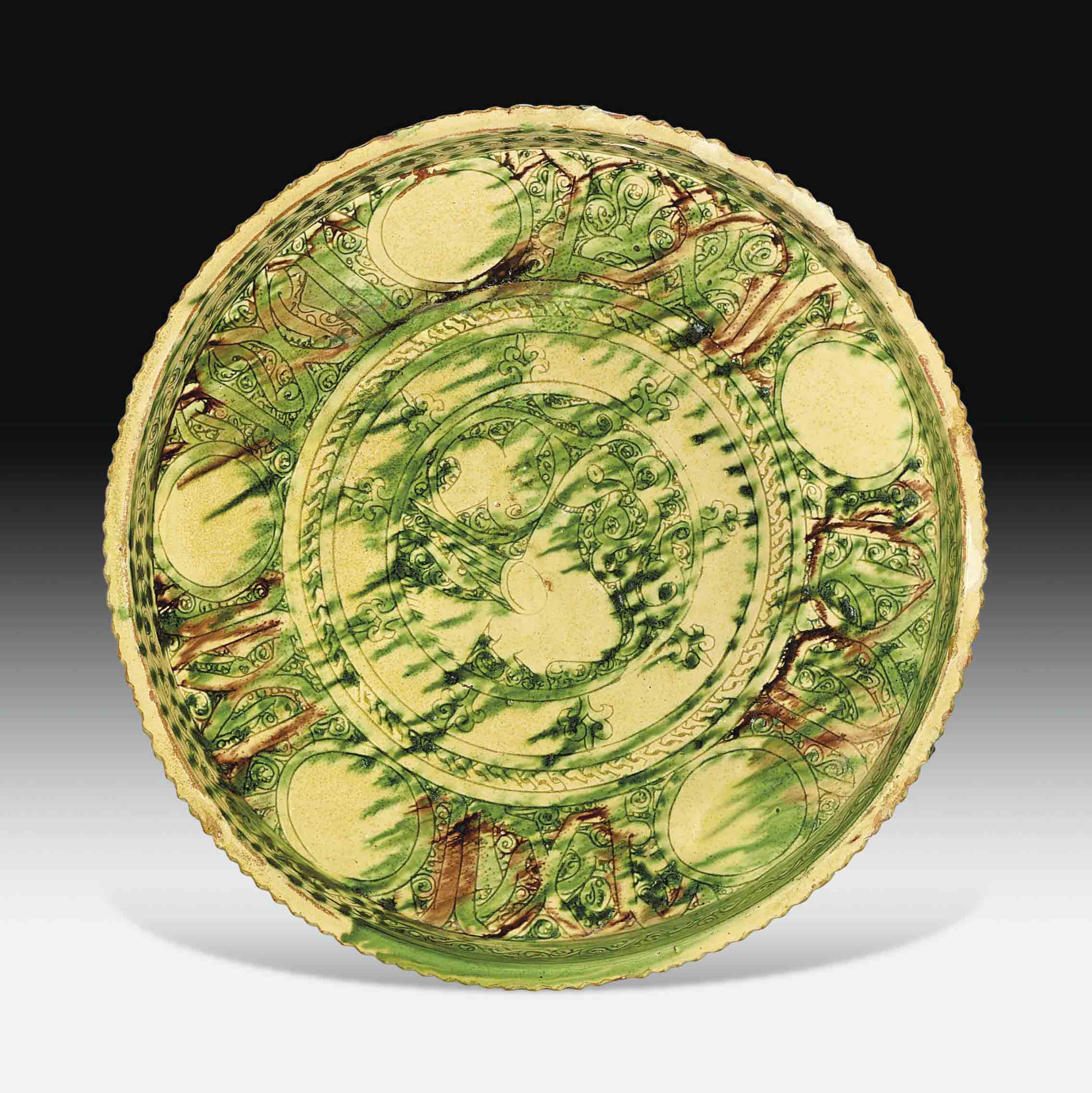 A LARGE BAMIYAN SGRAFFITO POTTERY DISH