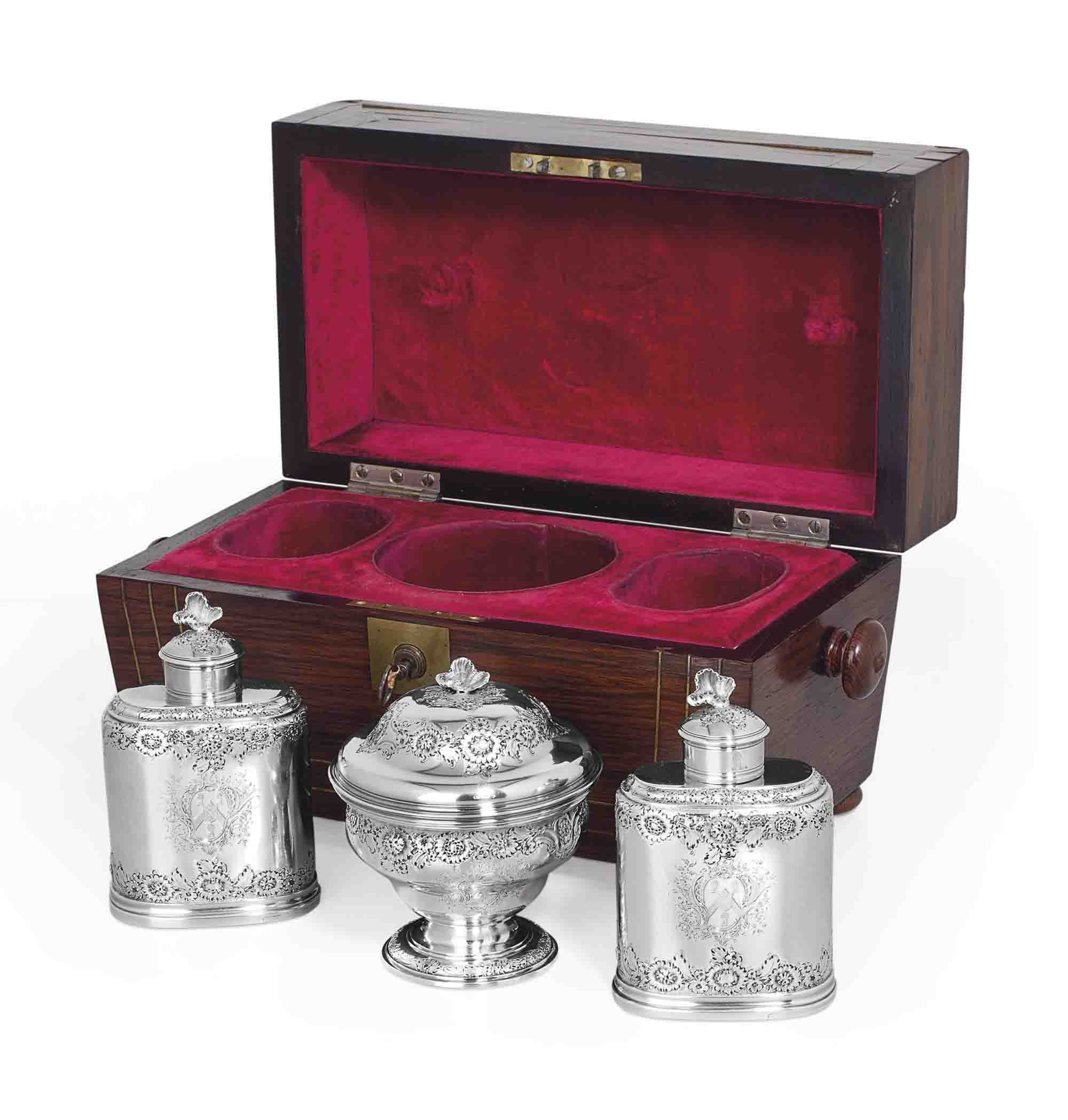 A GEORGE II SILVER TEA CADDY SET WITH CASE