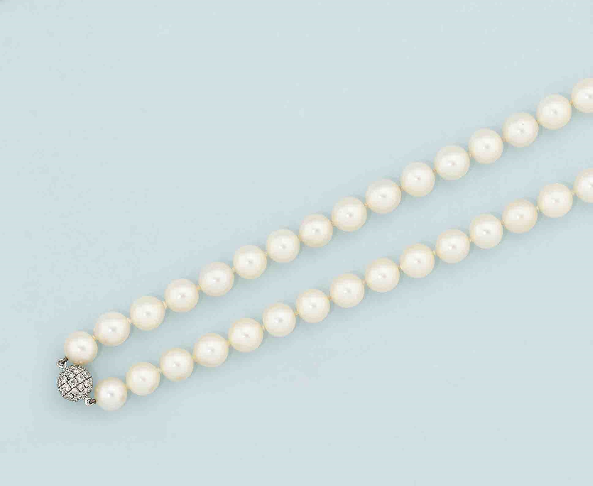 A cultured pearl and diamond necklace