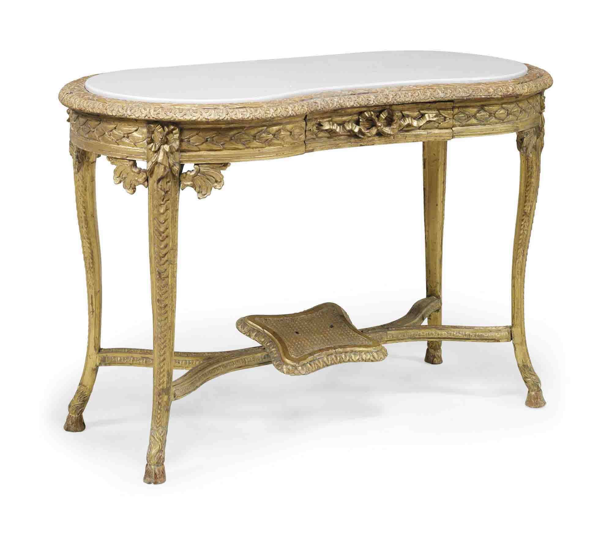 AN ITALIAN GILTWOOD AND COMPOSITION KIDNEY-SHAPED DRESSING TABLE