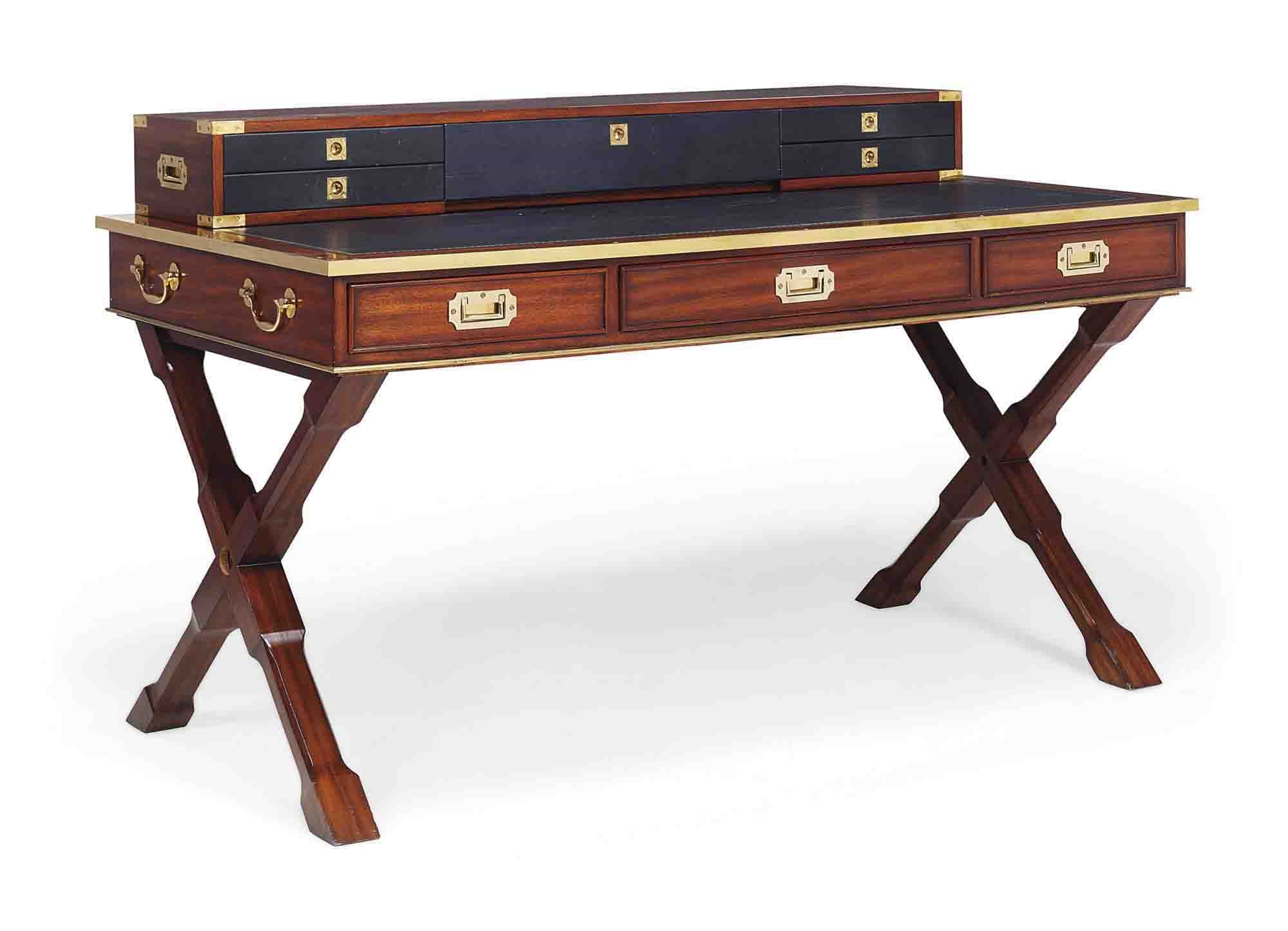 A BRASS AND LEATHER MOUNTED MAHOGANY DESK