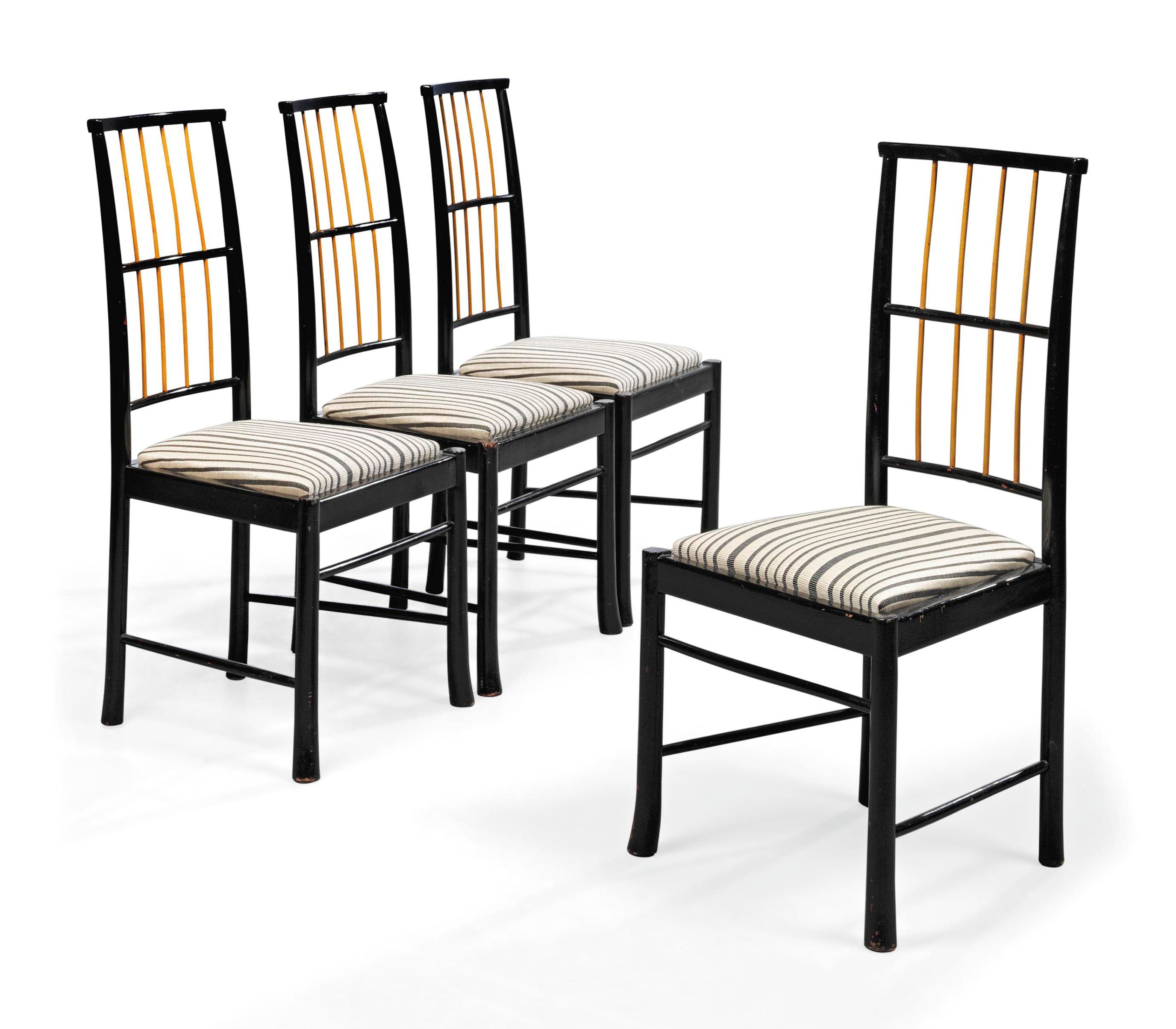 A SET OF FOUR SWEDISH FRUITWOOD AND EBONISED SIDE-CHAIRS
