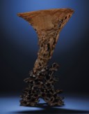 A FINELY CARVED 'PEONY PAVILION' RHINOCEROS HORN LIBATION CUP