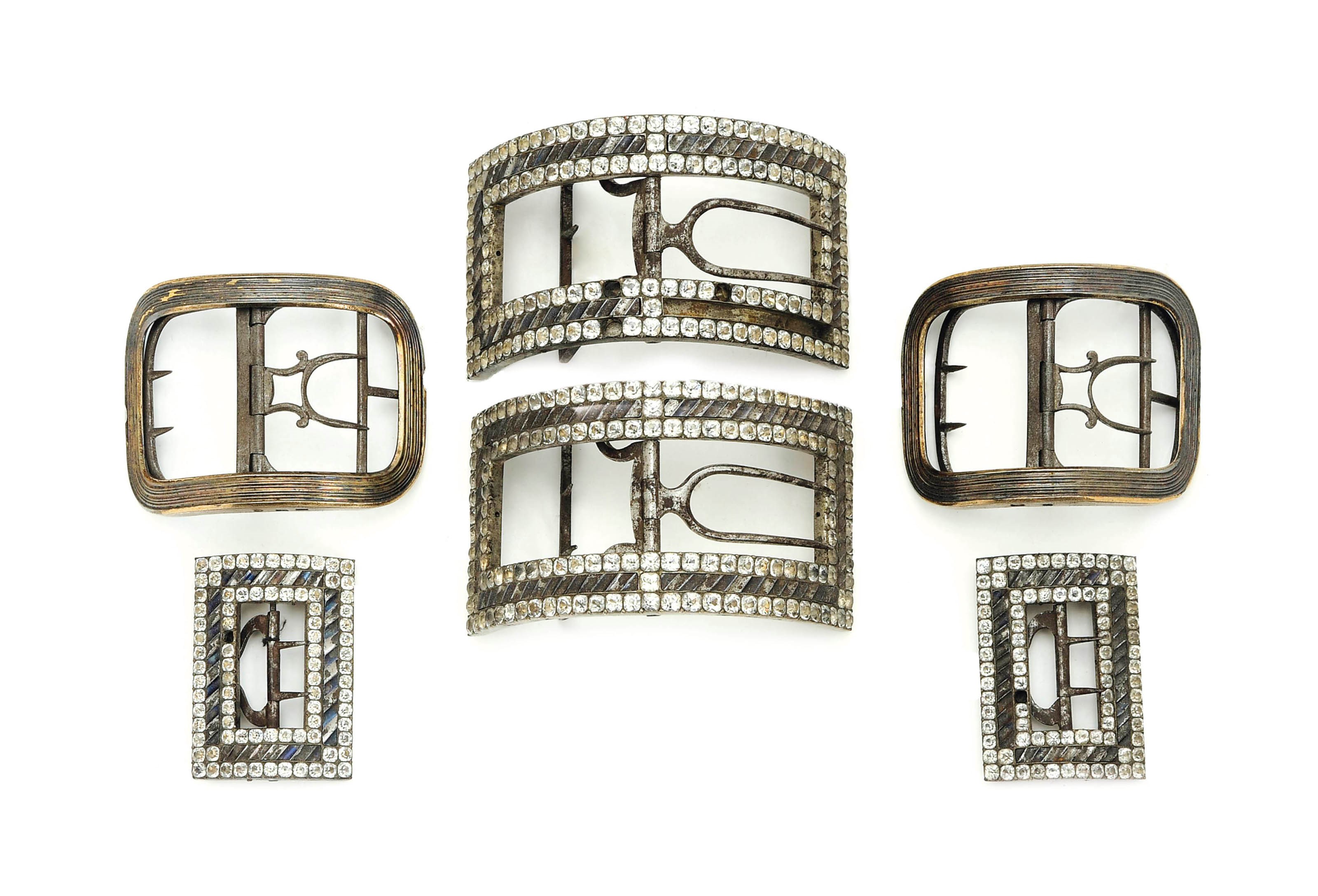 A PAIR OF FRENCH SILVER SHOE BUCKLES, AND A SET OF FOUR BUCKLES INSET WITH PASTE STONES,