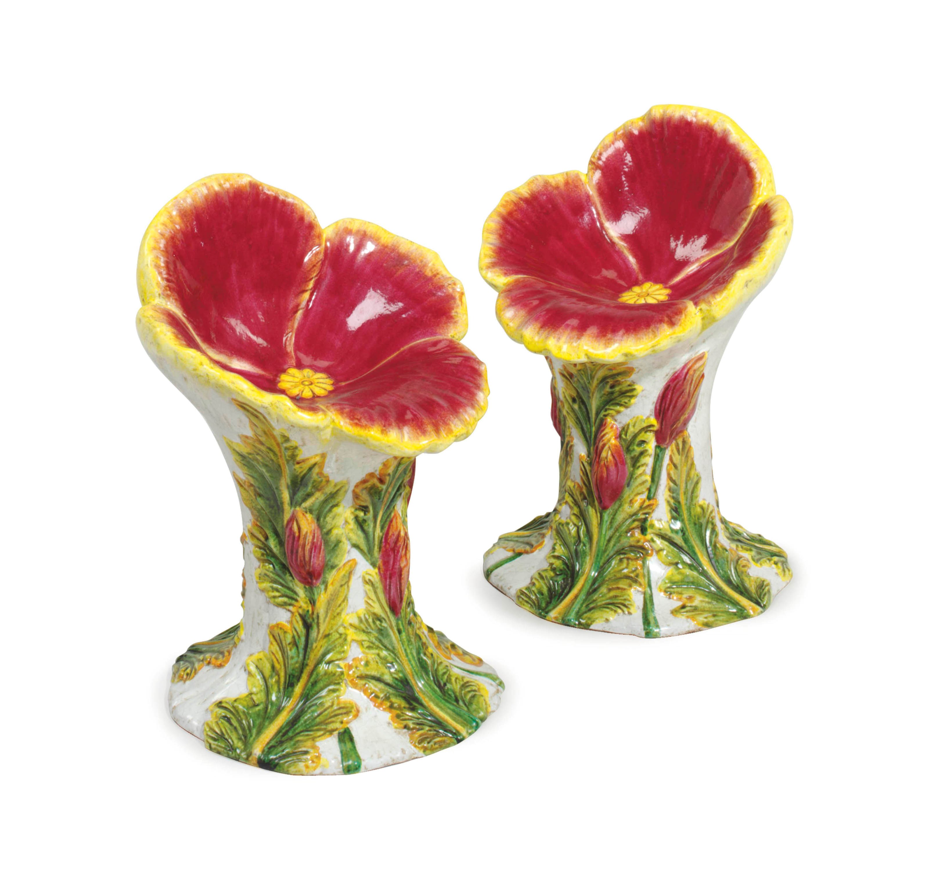 A PAIR OF MAJOLICA POLYCHROME-DECORATED FLORAL-FORM GARDEN SEATS,