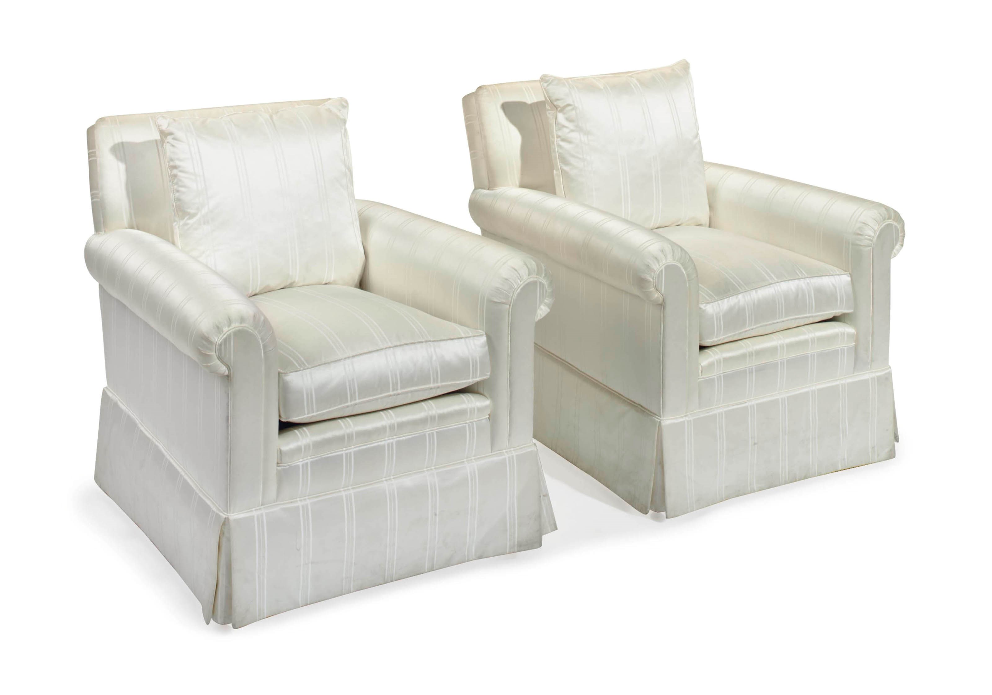 A PAIR OF WHITE SILK-UPHOLSTERED CLUB CHAIRS,
