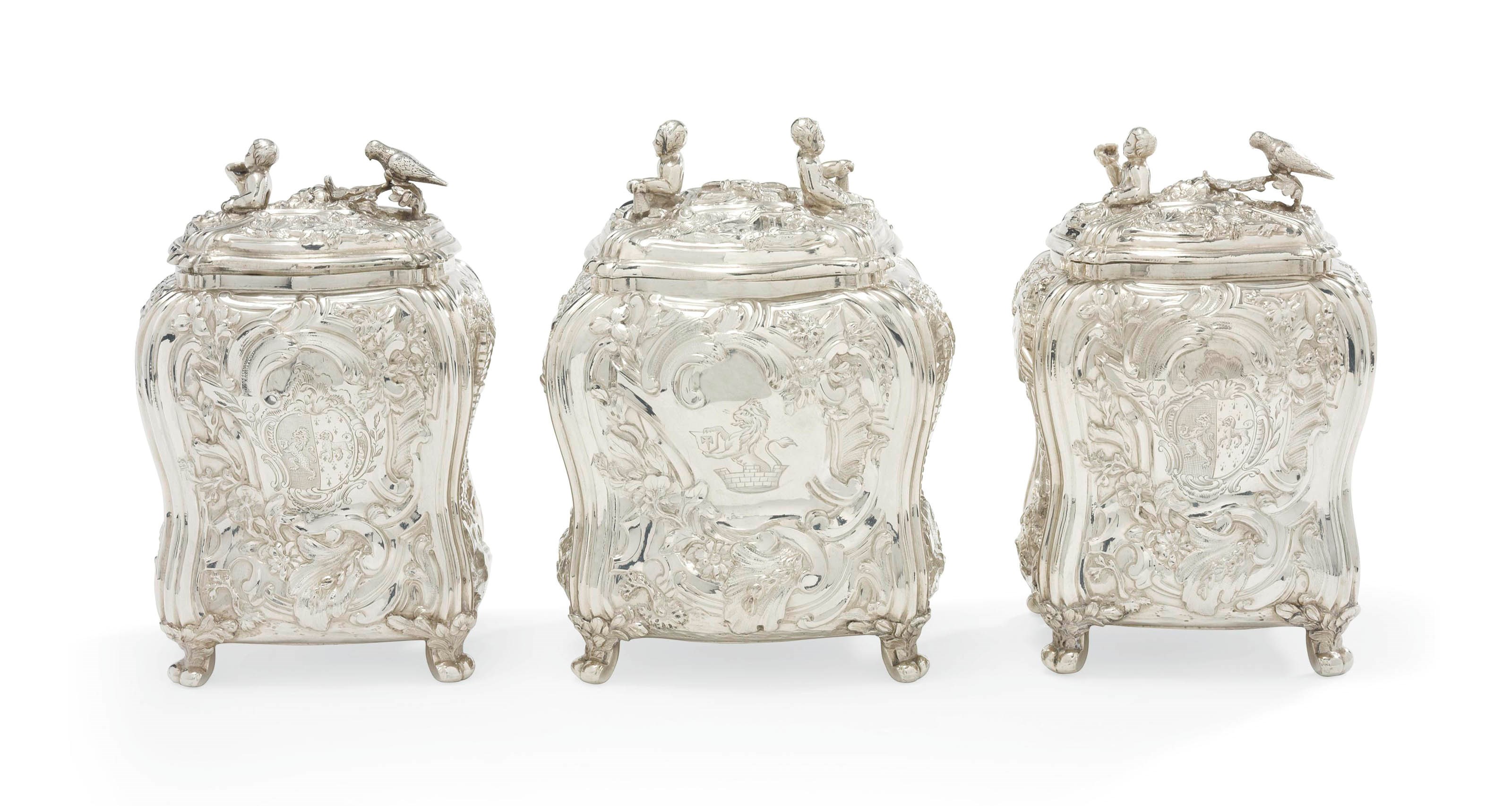 A PAIR OF GEORGE II SILVER TEA-CADDIES AND A SUGAR-BOX EN-SUITE
