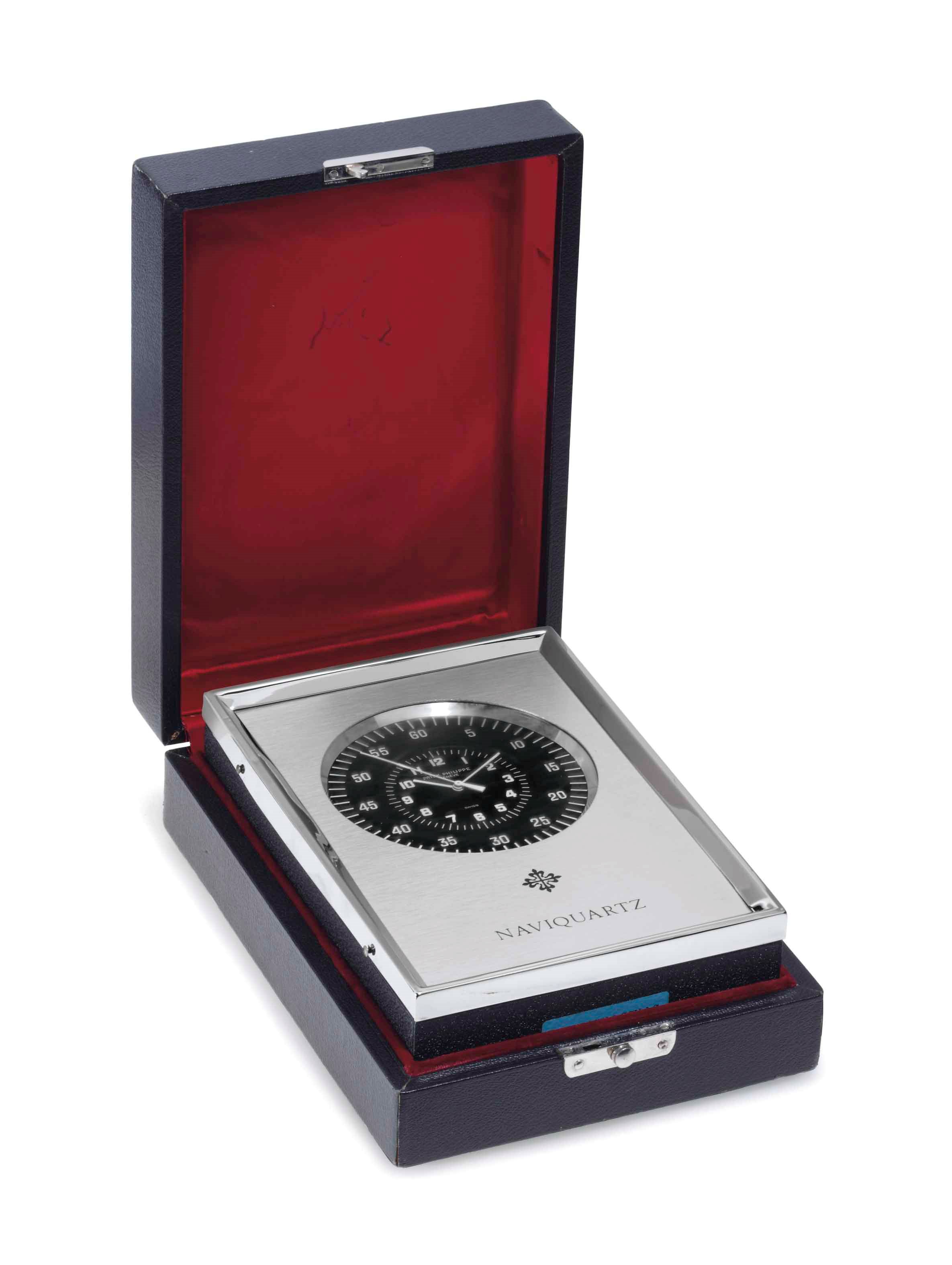Patek Philippe. An Aluminium Marine Chronometer With Jumping Center Seconds, Naviquartz Instructions Manual And Original Fitted Presentation Box