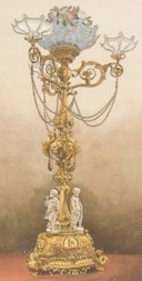 A MID-VICTORIAN GILT-BRASS AND PARIANWARE FIGURAL CENTREPIECE