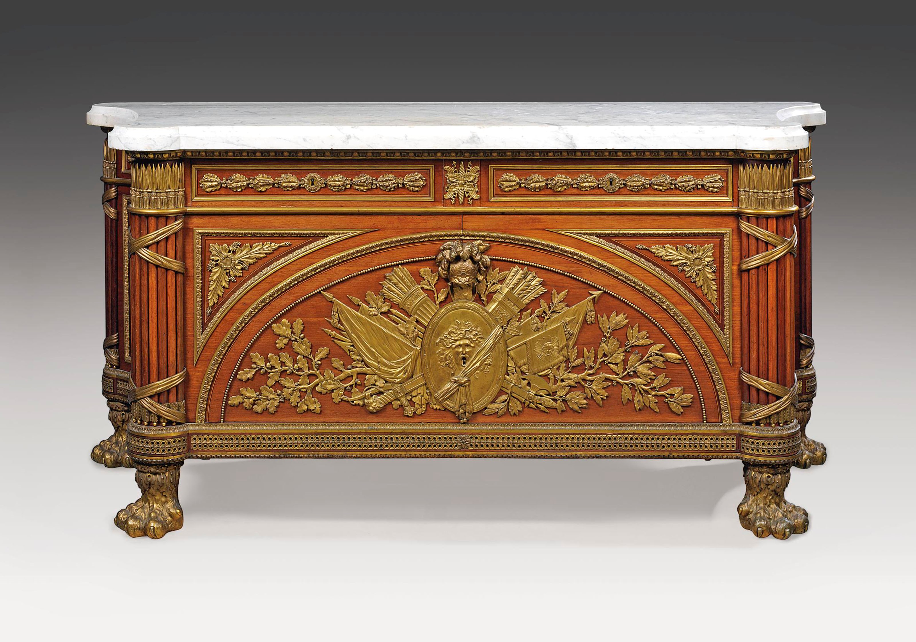 A FINE FRENCH ORMOLU-MOUNTED MAHOGANY COMMODE A VANTAUX