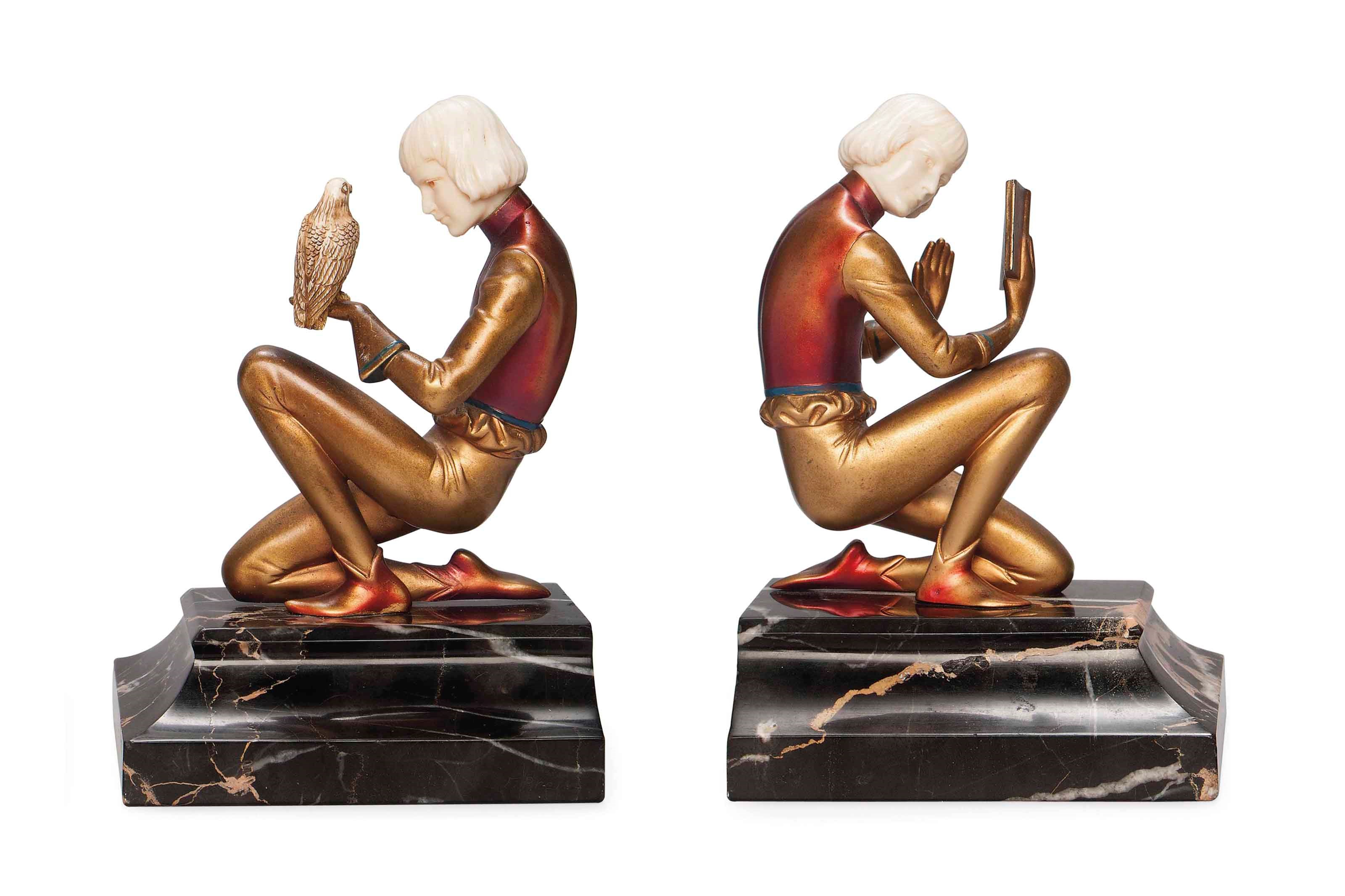 'PURSUITS OF YOUTH' A PAIR OF FERDINAND PREISS COLD-PAINTED BRONZE AND IVORY FIGURAL BOOKENDS