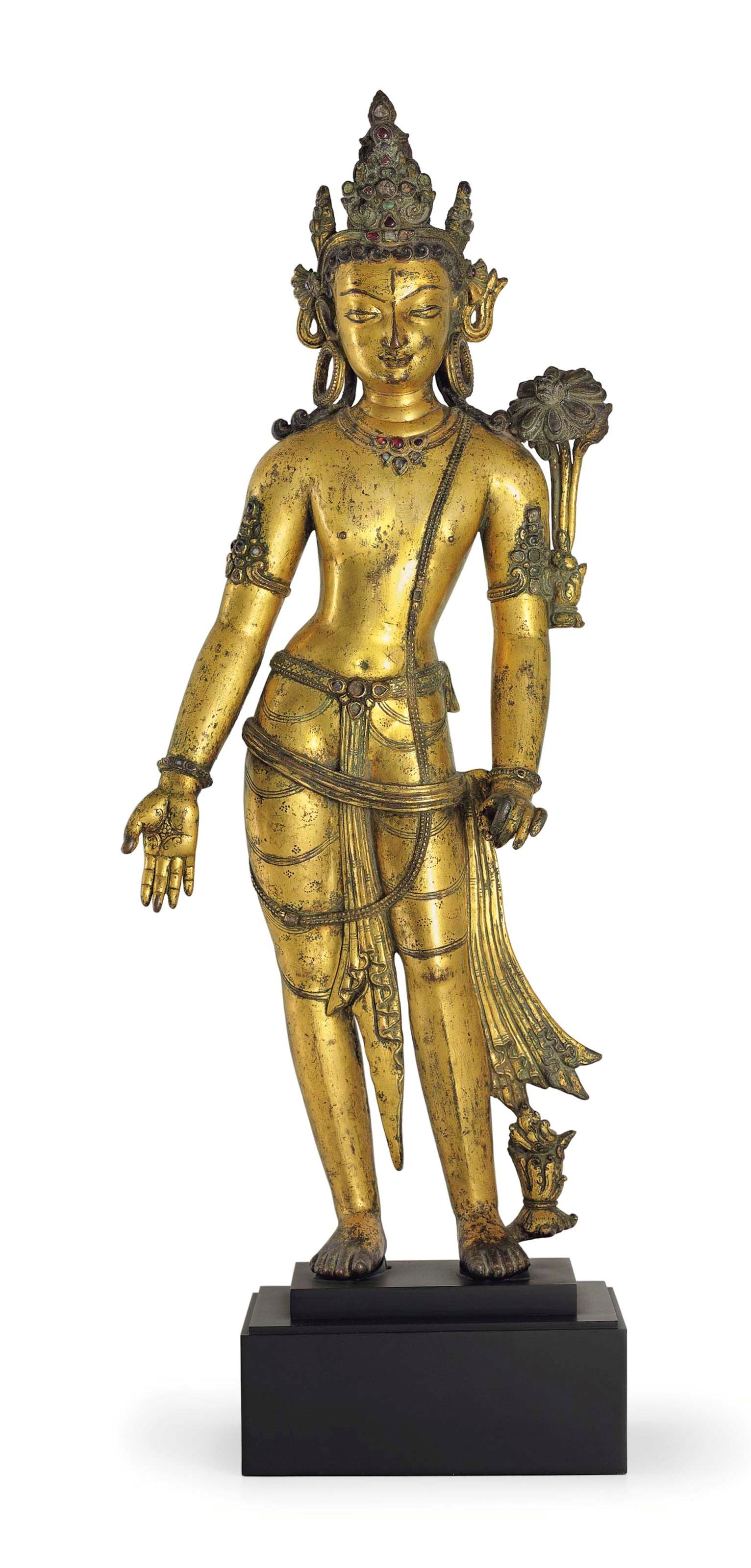 An important gilt bronze figure of Padmapani