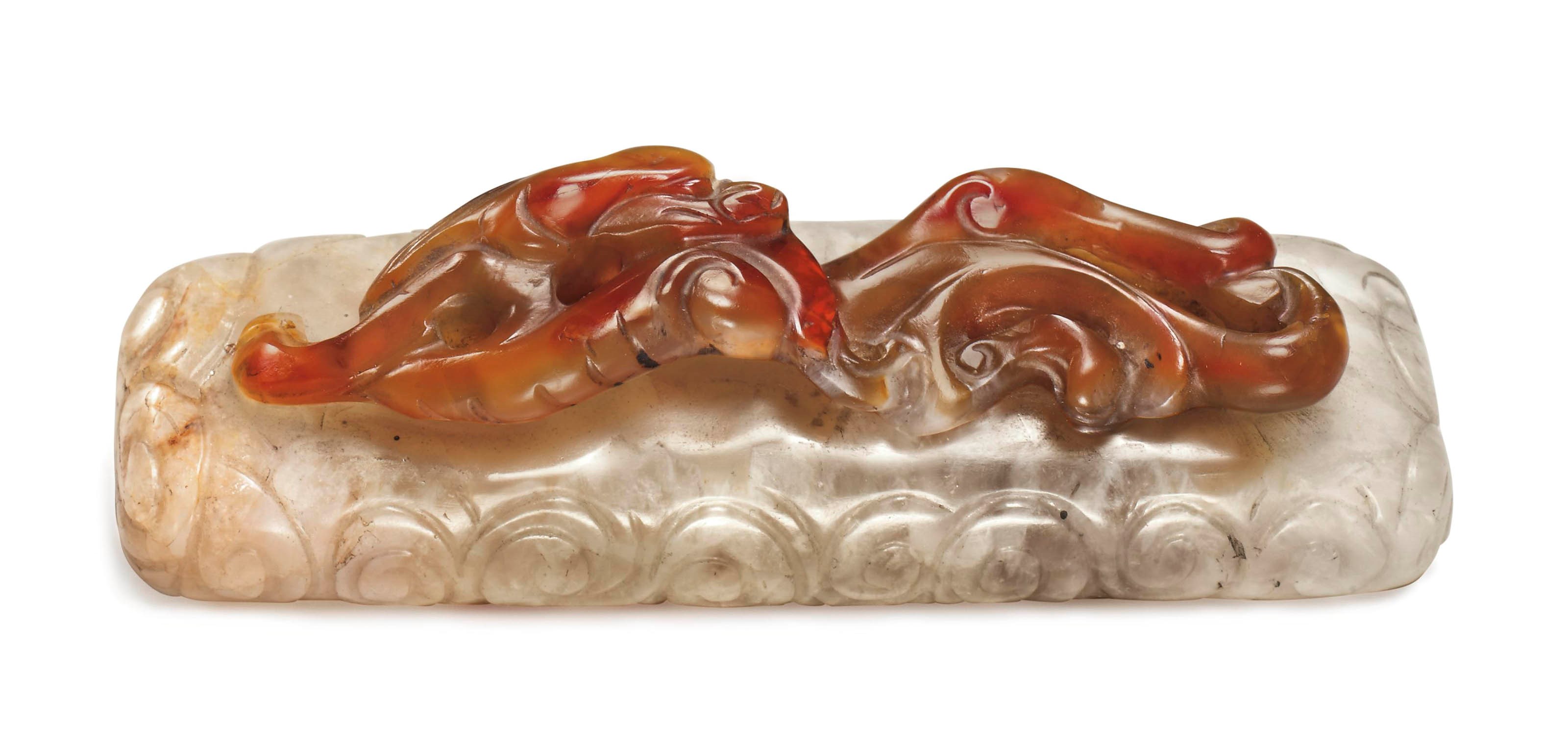 AN UNUSUAL TWO-COLOR AGATE WEIGHT OR BRUSH REST