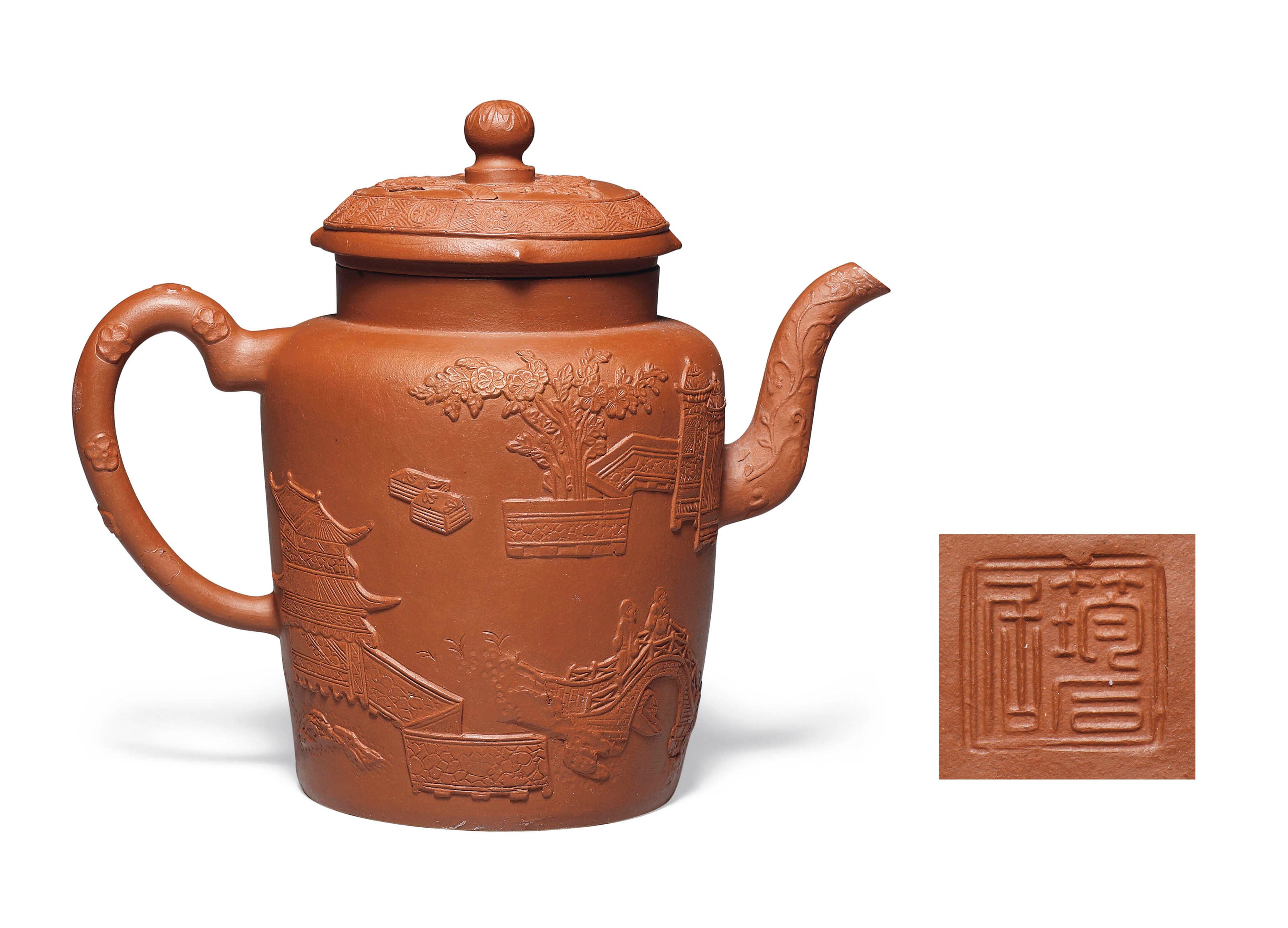 A BROWNISH-RED YIXING TEAPOT AND COVER
