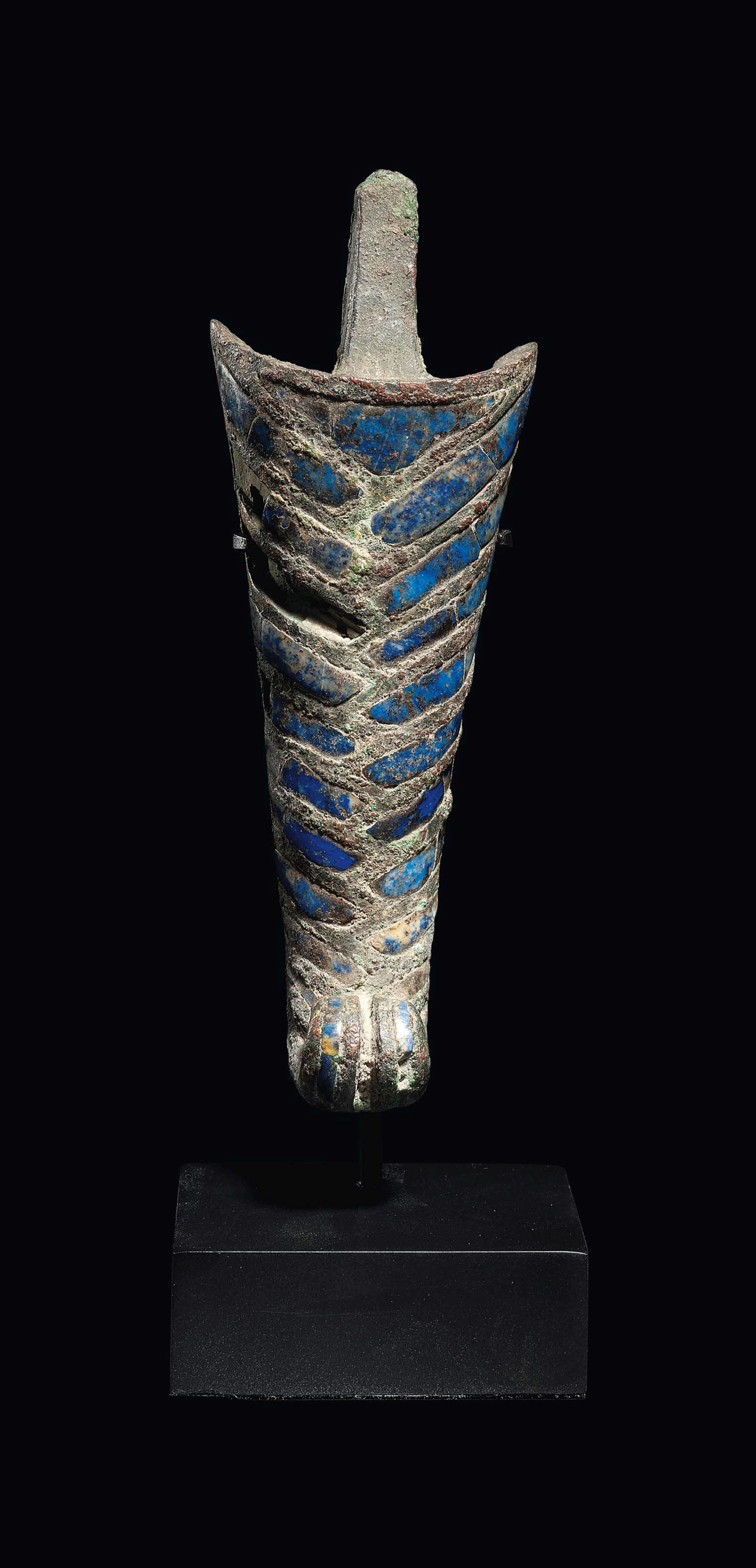 AN EGYPTIAN BRONZE AND LAPIS LAZULI FALSE BEARD