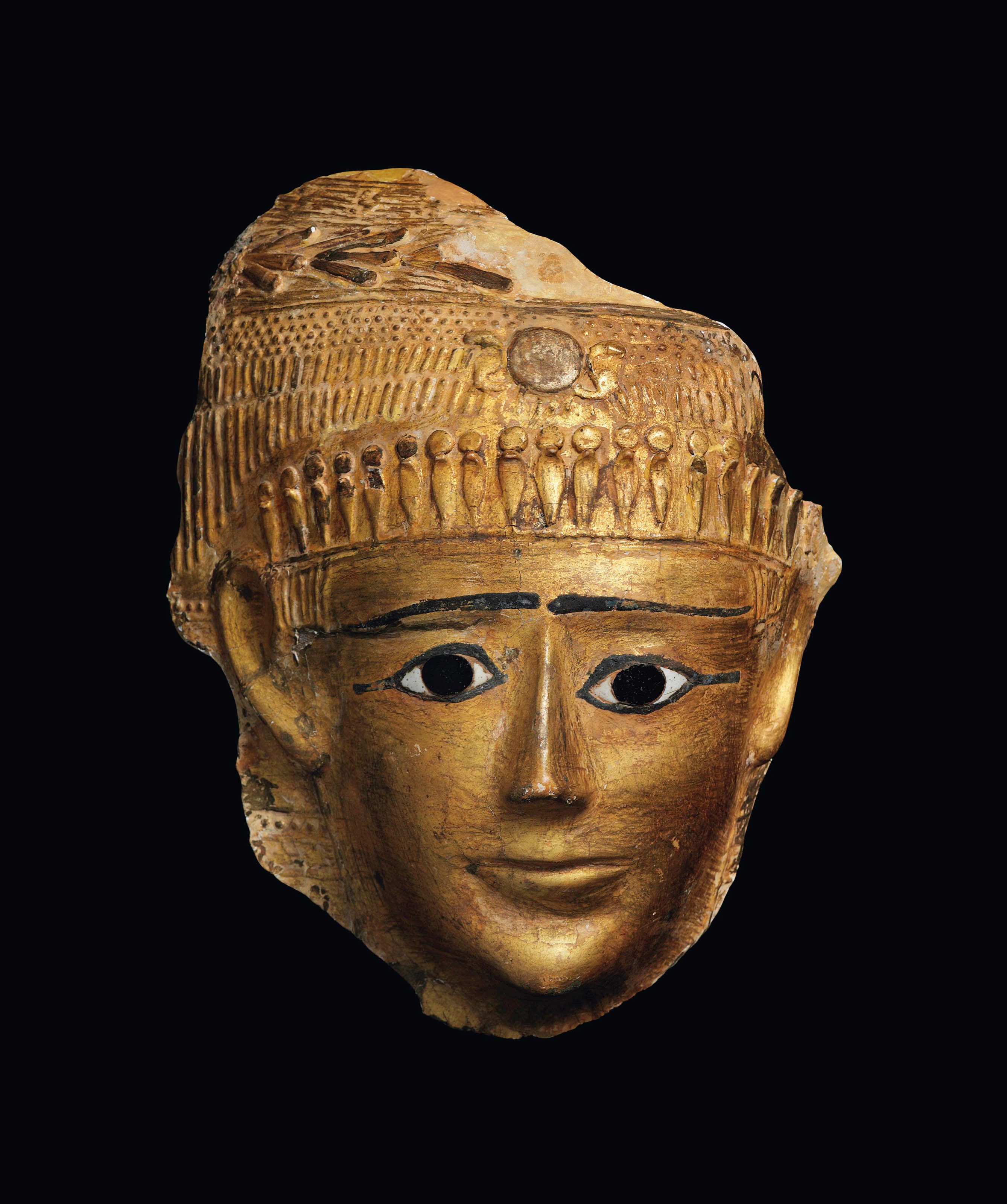 AN EGYPTIAN GILT CARTONNAGE MUMMY MASK