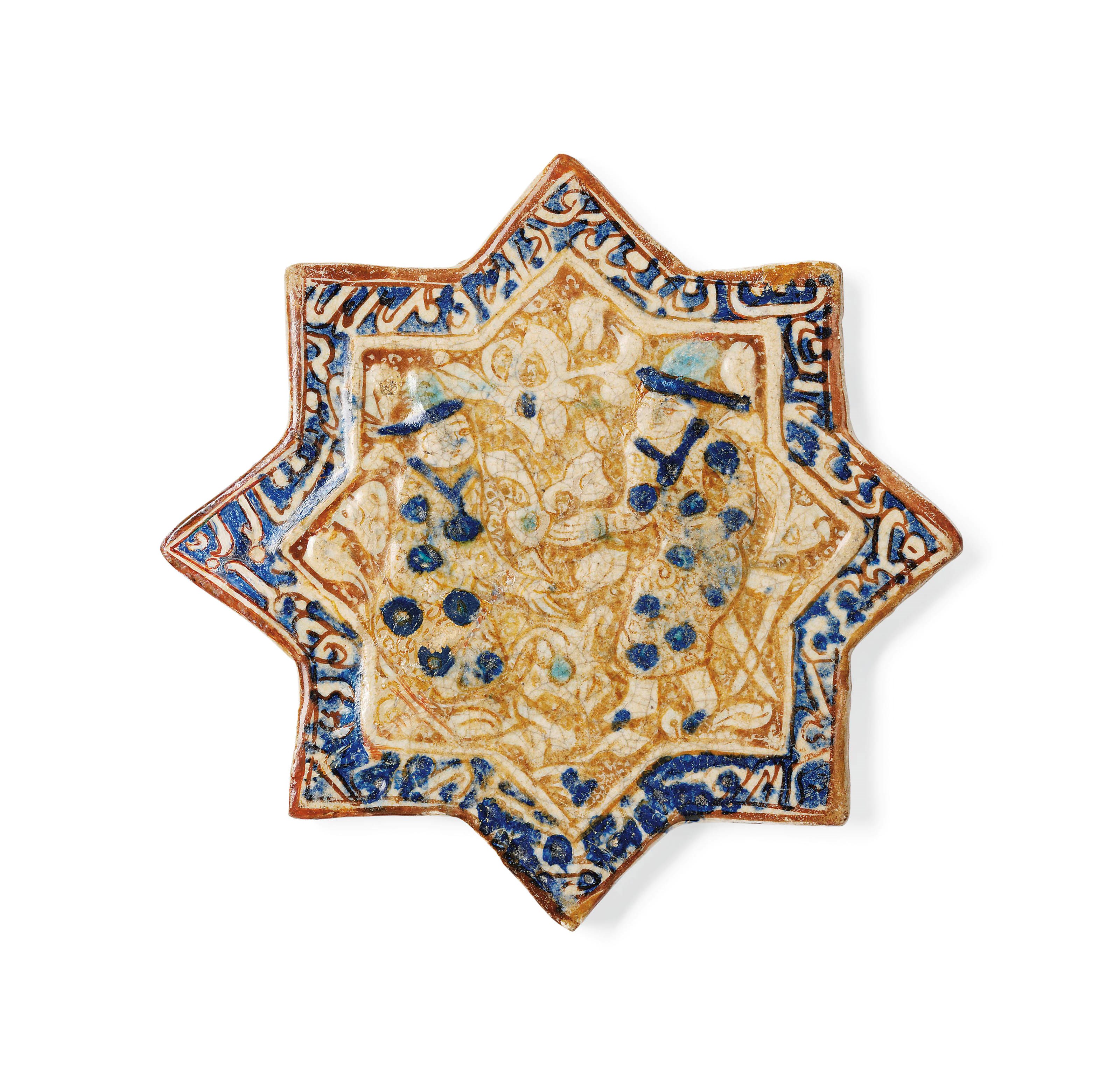 AN ILKHANID MOULDED LUSTRE STAR TILE