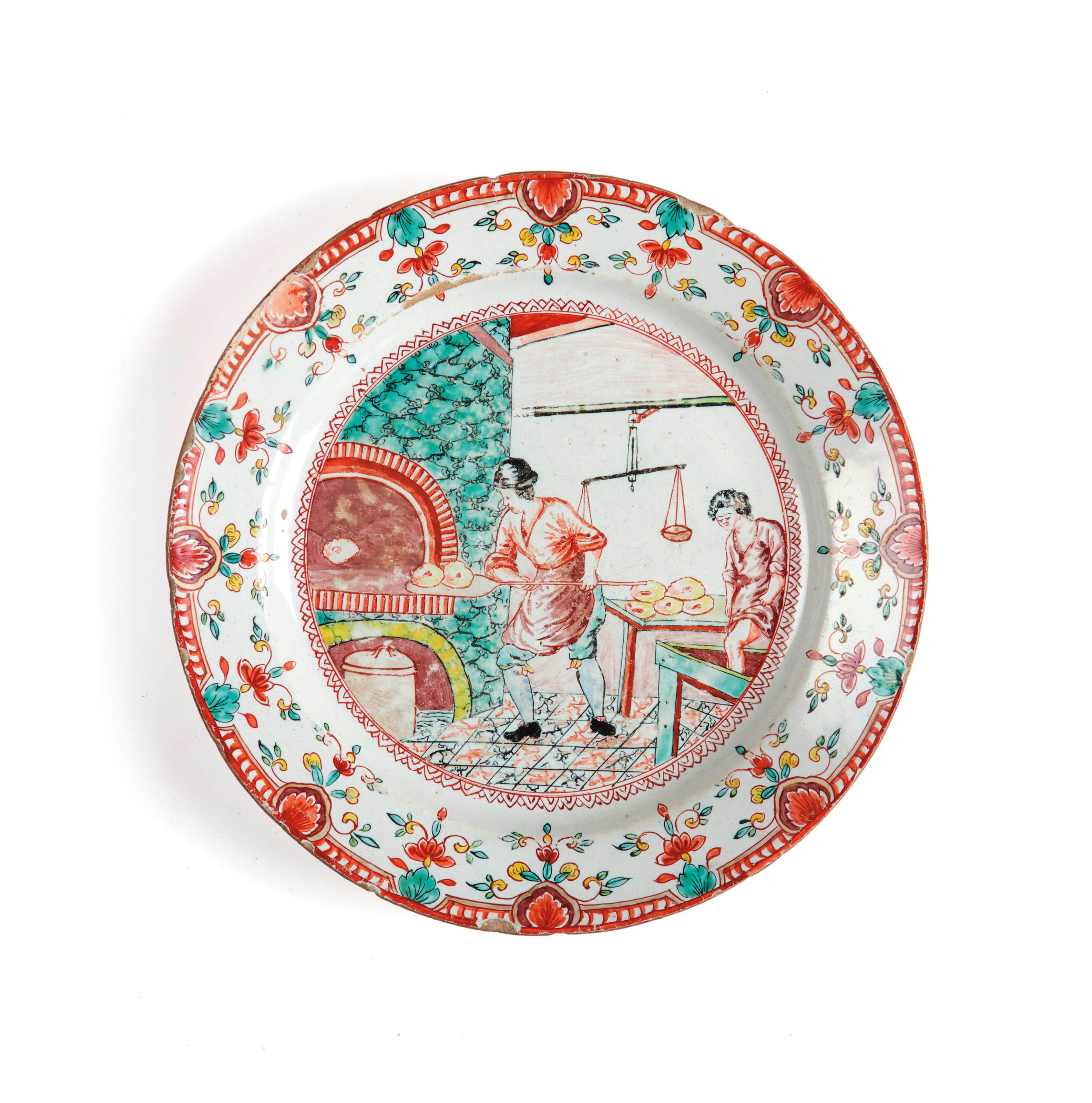 A Dutch Delft dore 'genre' plate