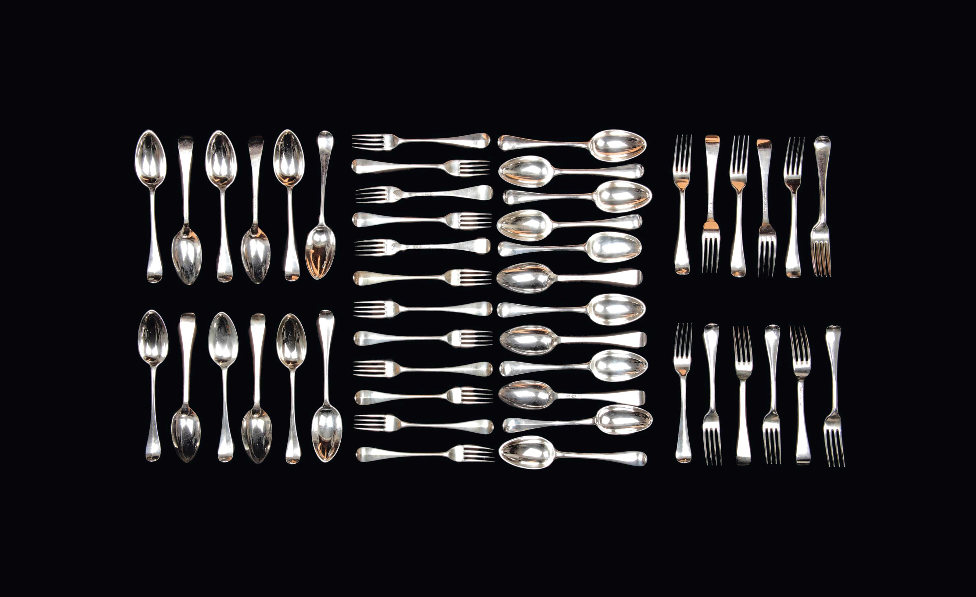 Two sets of Dutch silver spoons and forks