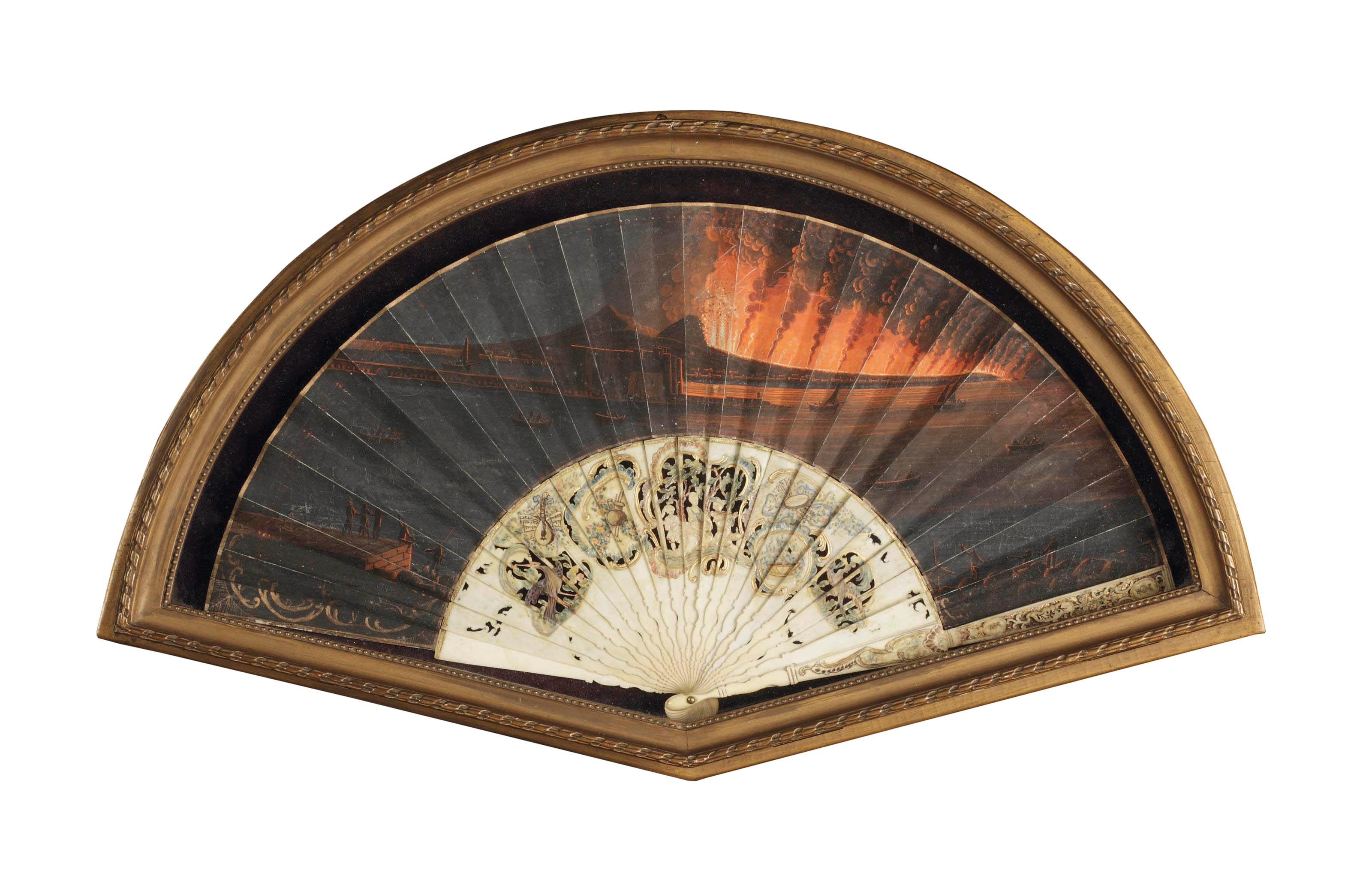 A PARCEL-GILT PIERCED IVORY AND PAPER FAN DEPICTING THE ERUPTION OF VESUVIUS