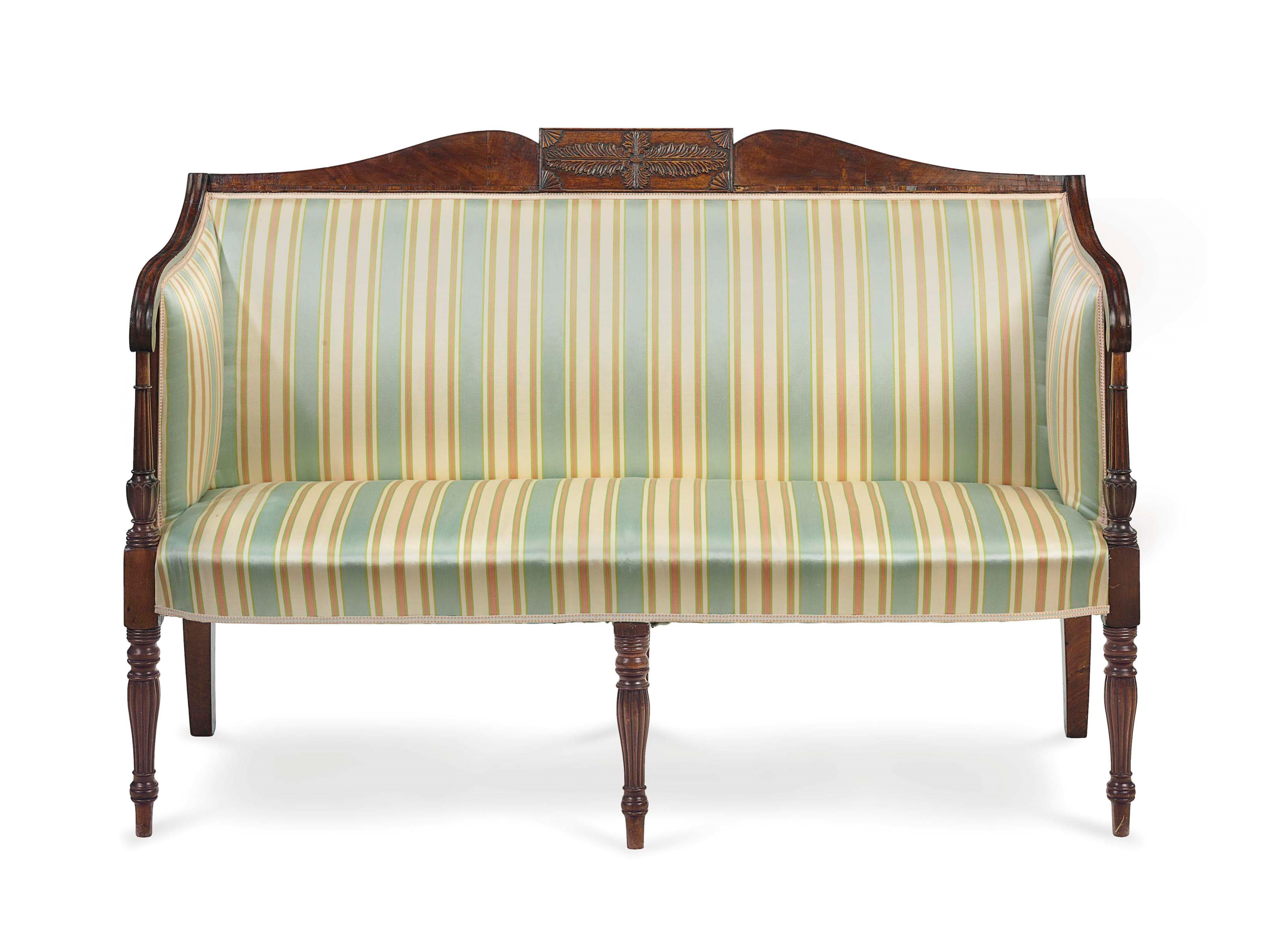 A FEDERAL CARVED AND VENEERED MAHOGANY SETTEE